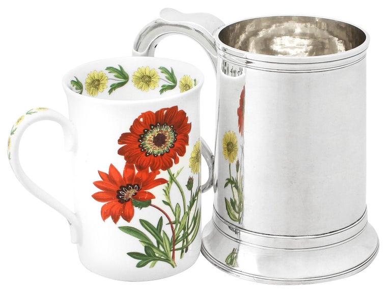 An exceptional, fine and impressive antique Georgian Newcastle sterling silver pint mug made by John Langlands I & John Robertson I; an addition to our collectable silverware collection

This fine antique George III sterling silver pint mug has a