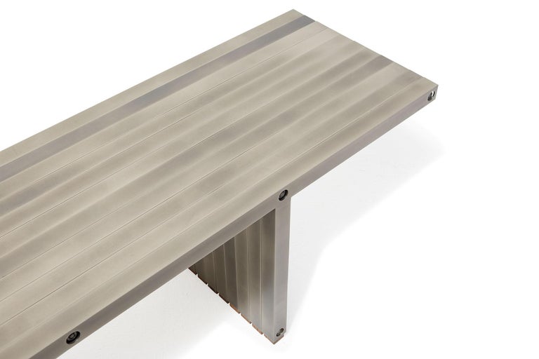 Antique Nickel Aluminum Compression Bench For Sale at 1stDibs