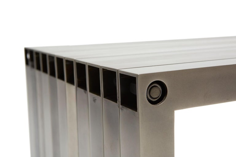 Antique Nickel Aluminum Compression Bench For Sale at 1stDibs