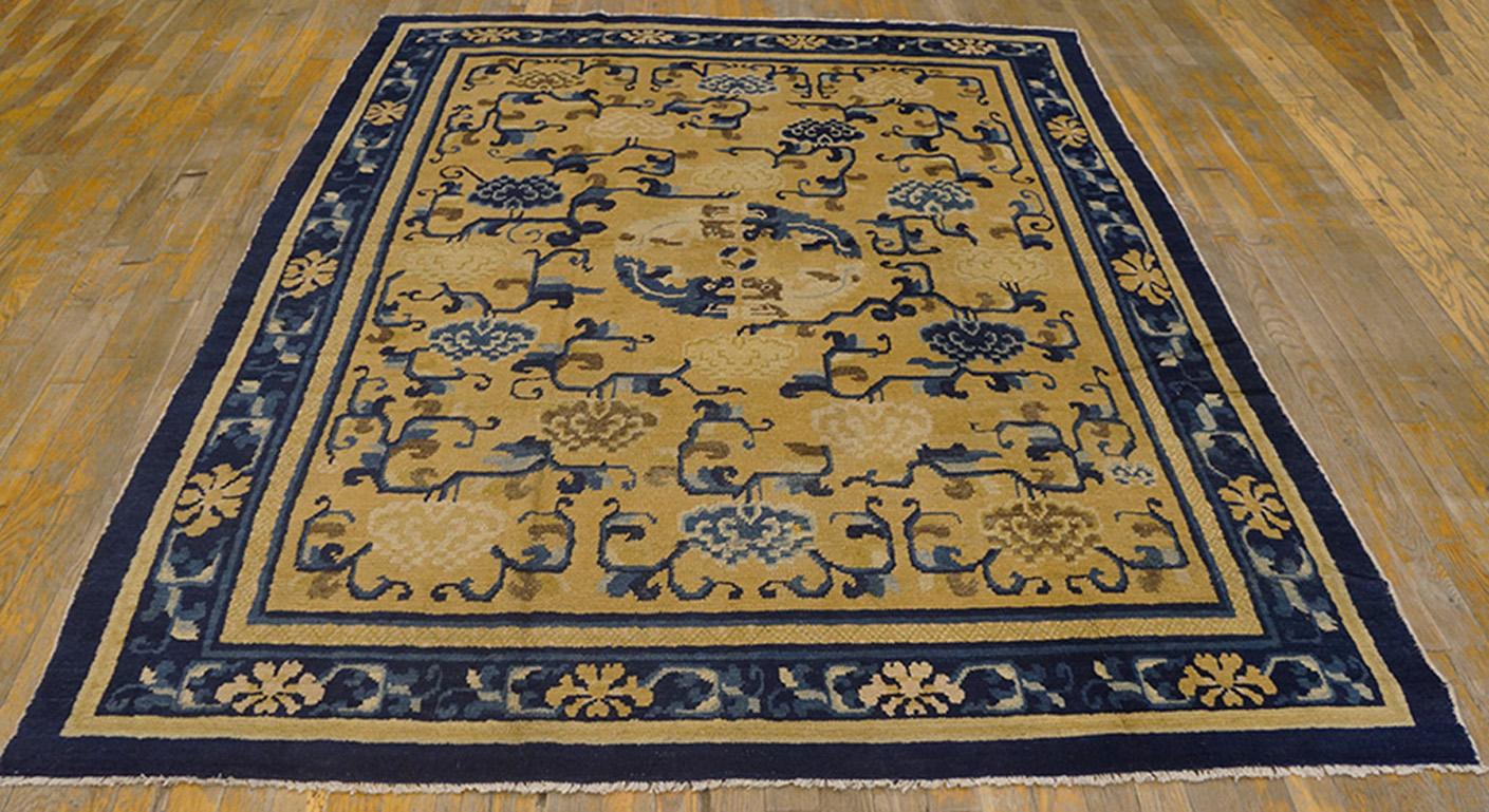 Ningxia loves peonies, lion dogs and yellow grounds. This rug has all three: rows of colorful peonies and their leafy stems; found lion dogs circling to make an openwork medallion, and a mellow light gold field. This circa 1830 northern Chinese rug