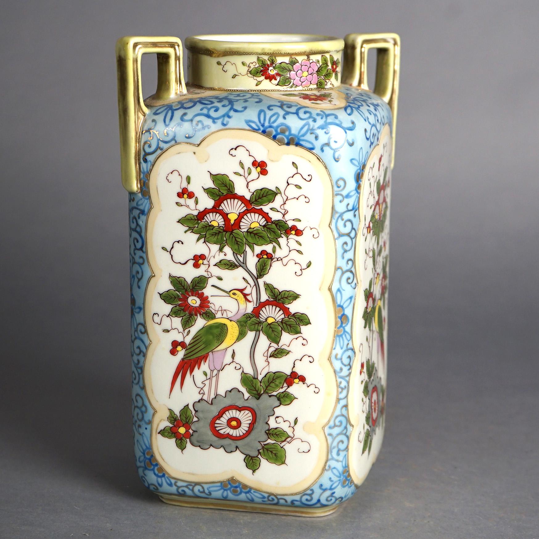 Antique Nippon Floral Hand Painted Porcelain Double Handled Vase C1920

Measures- 10.75''H x 7.5''W x 5.75''D