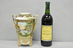 Antico vaso a due manici in porcellana dipinta a mano Nippon con scena del cigno e del lago