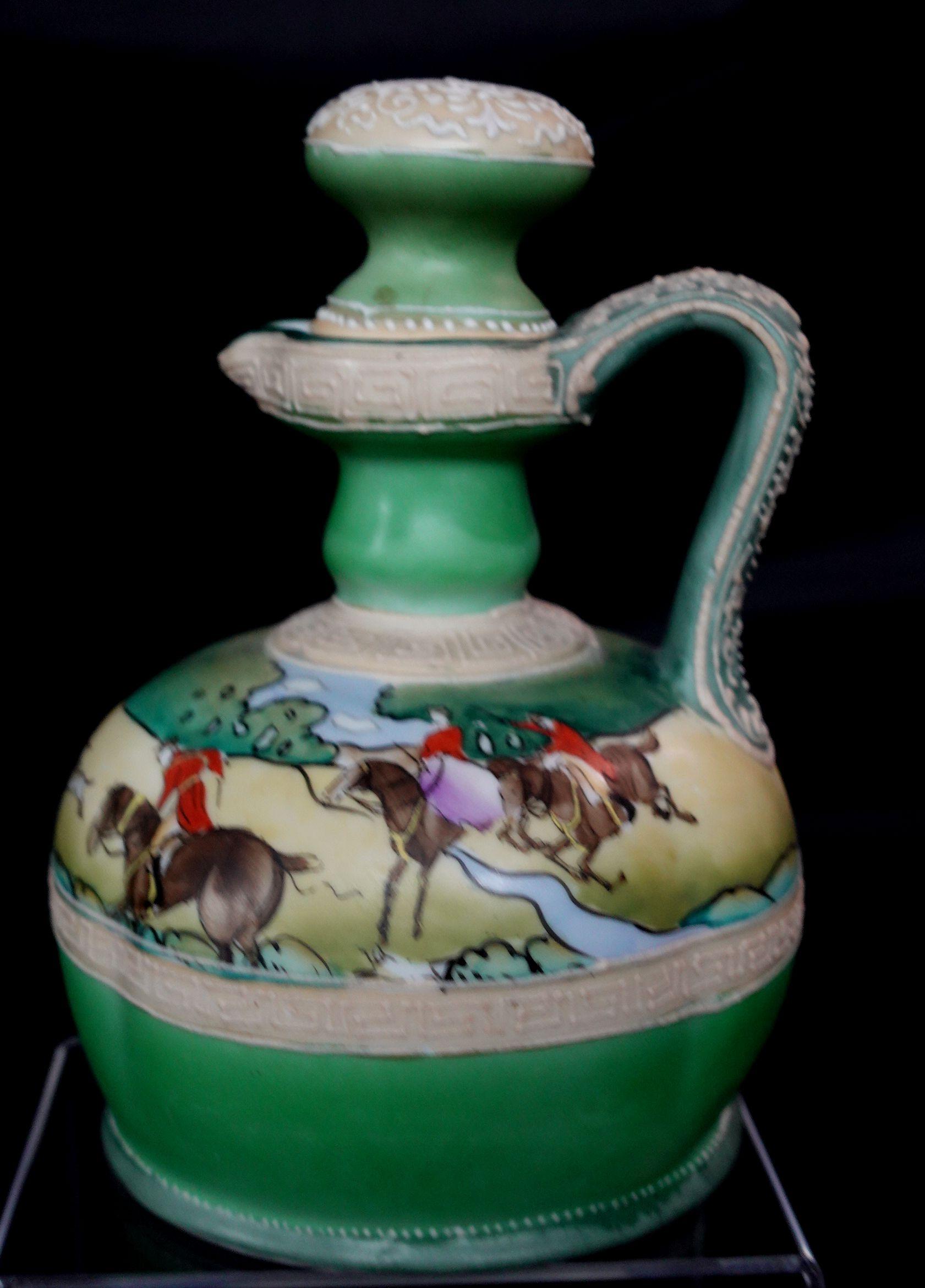 Antique 1900s nippon Moriage whiskey jugs with English Hunt Scene, hand-painted signed, and marked at the bottom.
   
