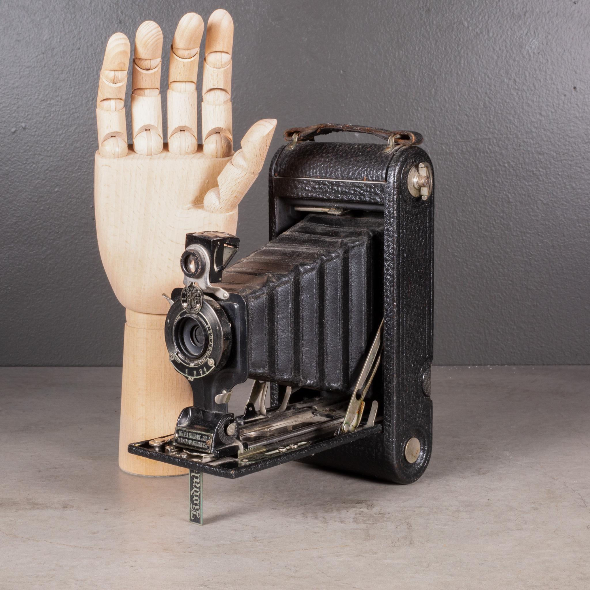 ABOUT  

The body of camera is leather wrapped with a leather handle and brass and chrome accents. It folds smoothly closed to 1.75 inches.

Sold for decorative purposes only. May or may not work.

    CREATOR Eastman Kodak Company
    DATE OF