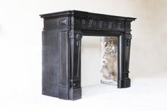 Antique Noir de Mazy marble mantel surround in style of XVI, the 19th century