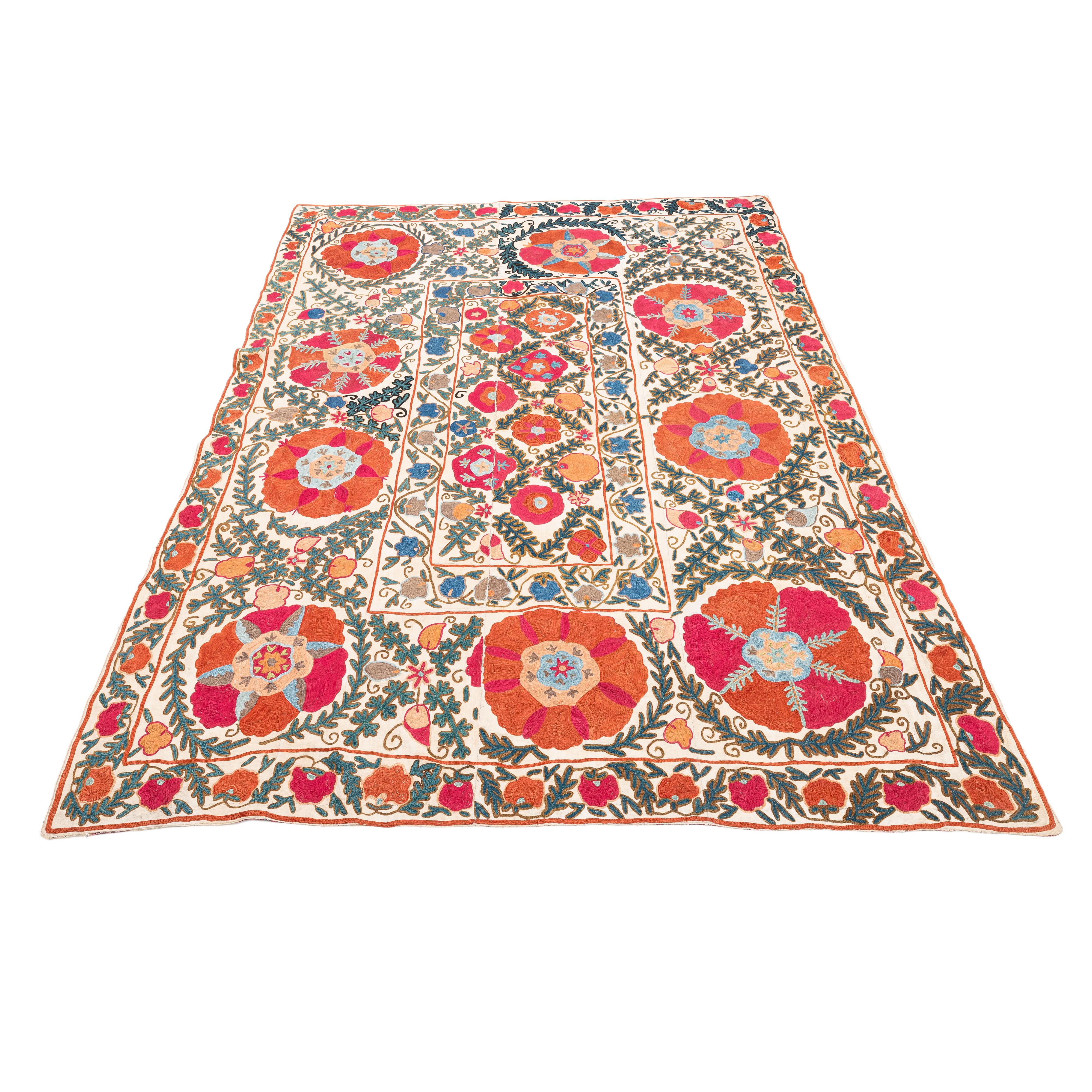 A charming Nim suzani from Bukhara, with exultant colouring and workmanship. It has no lining but it could be lined upon request.

General Info On Suzanis

Uzbek Suzani, a captivating textile art form originating from Central Asia, embodies a rich