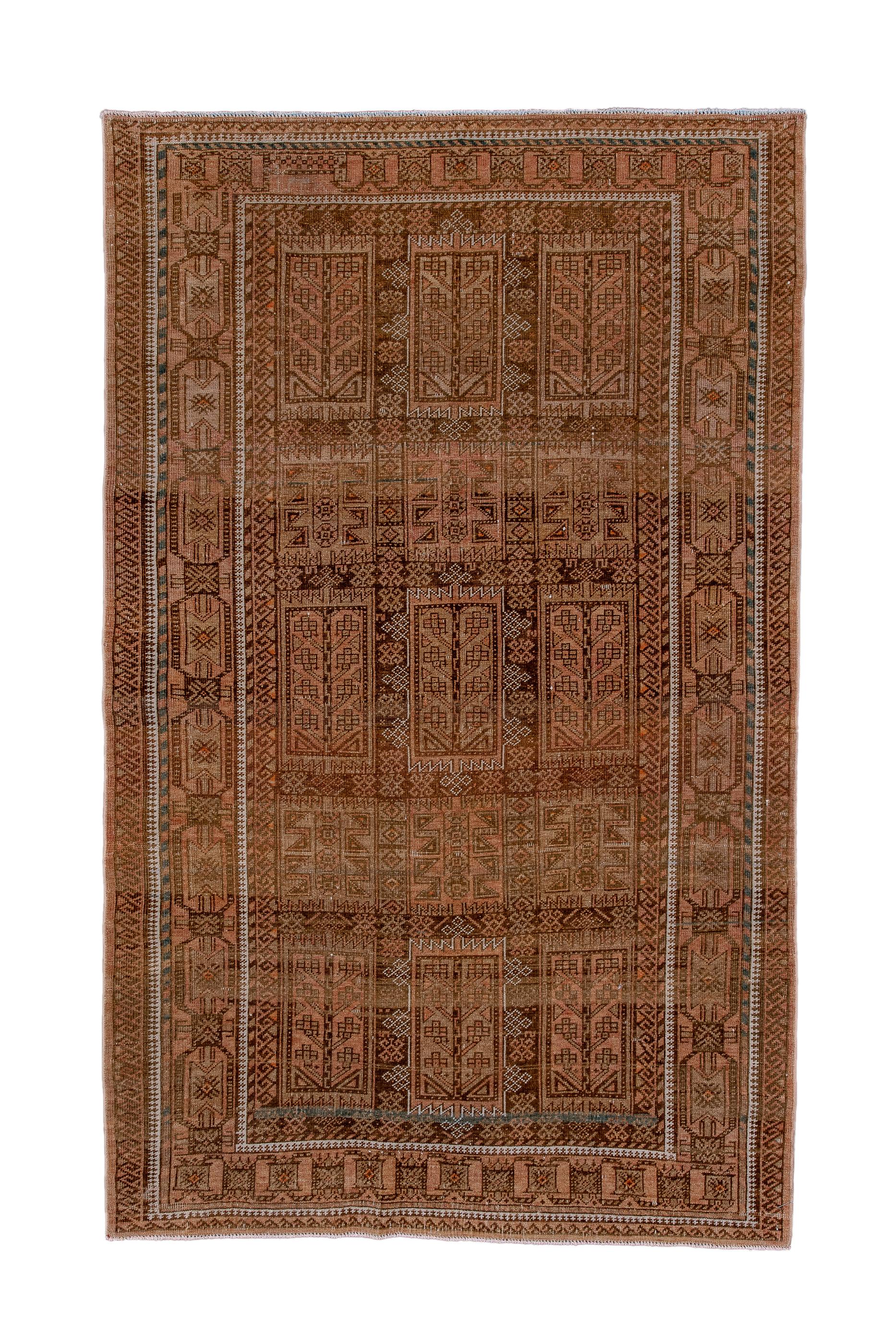 Or from western Afghanistan. This totally nomadic scatter rug shows a grid pattern of three rows of three rectangles enclosing single, stylized flowers and rows of shorter squares with Zee patterns. Coral-brown field and border. Open hexagon and
