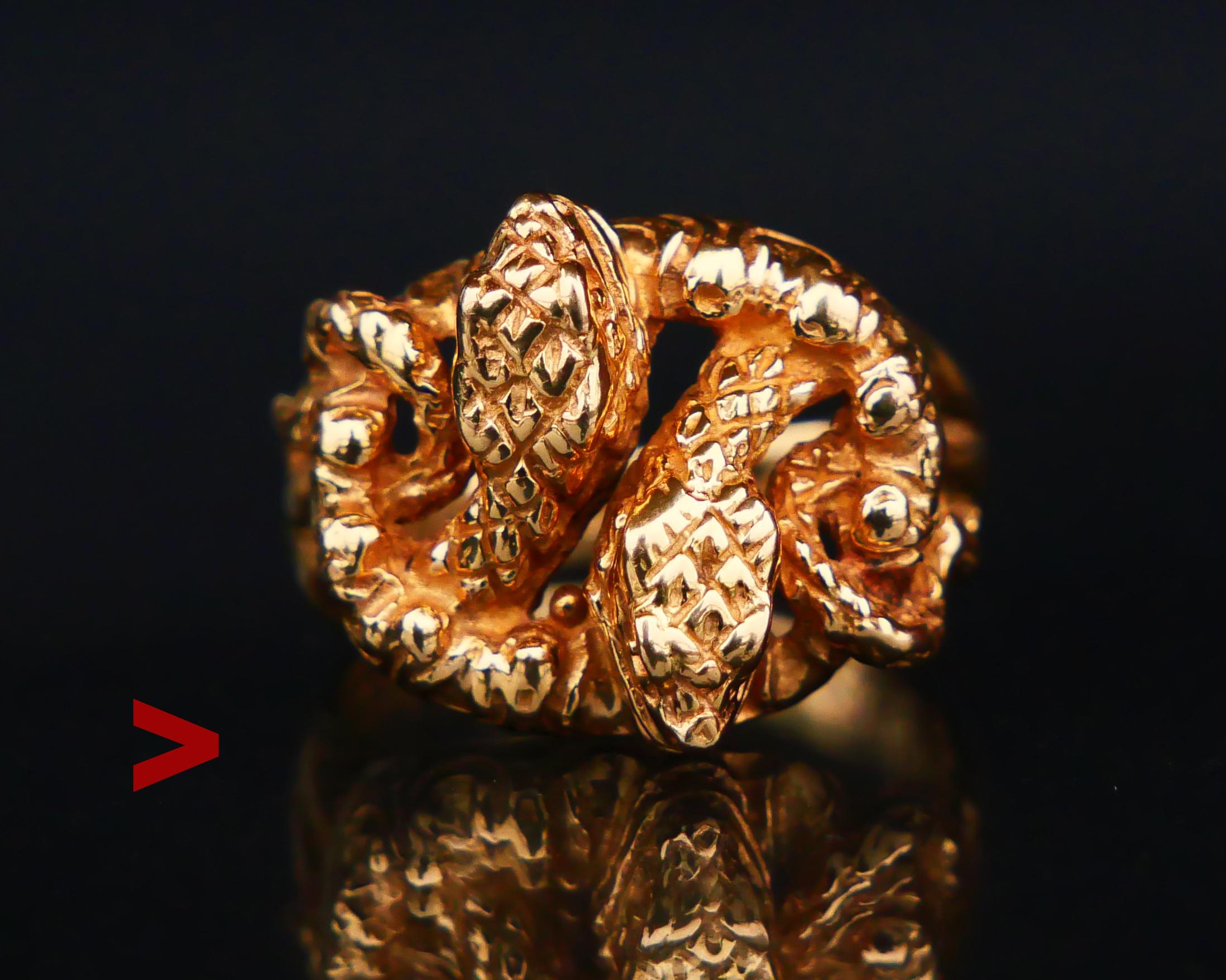 Antique Ring for Men or Women Designed as Interweaving Snakes in solid 18K Yellow Gold. Cast bodies of reptiles with detailed scales, eyes, and teeth.

The design of this ring is unisex, it will look nice on male or female fingers if the size is