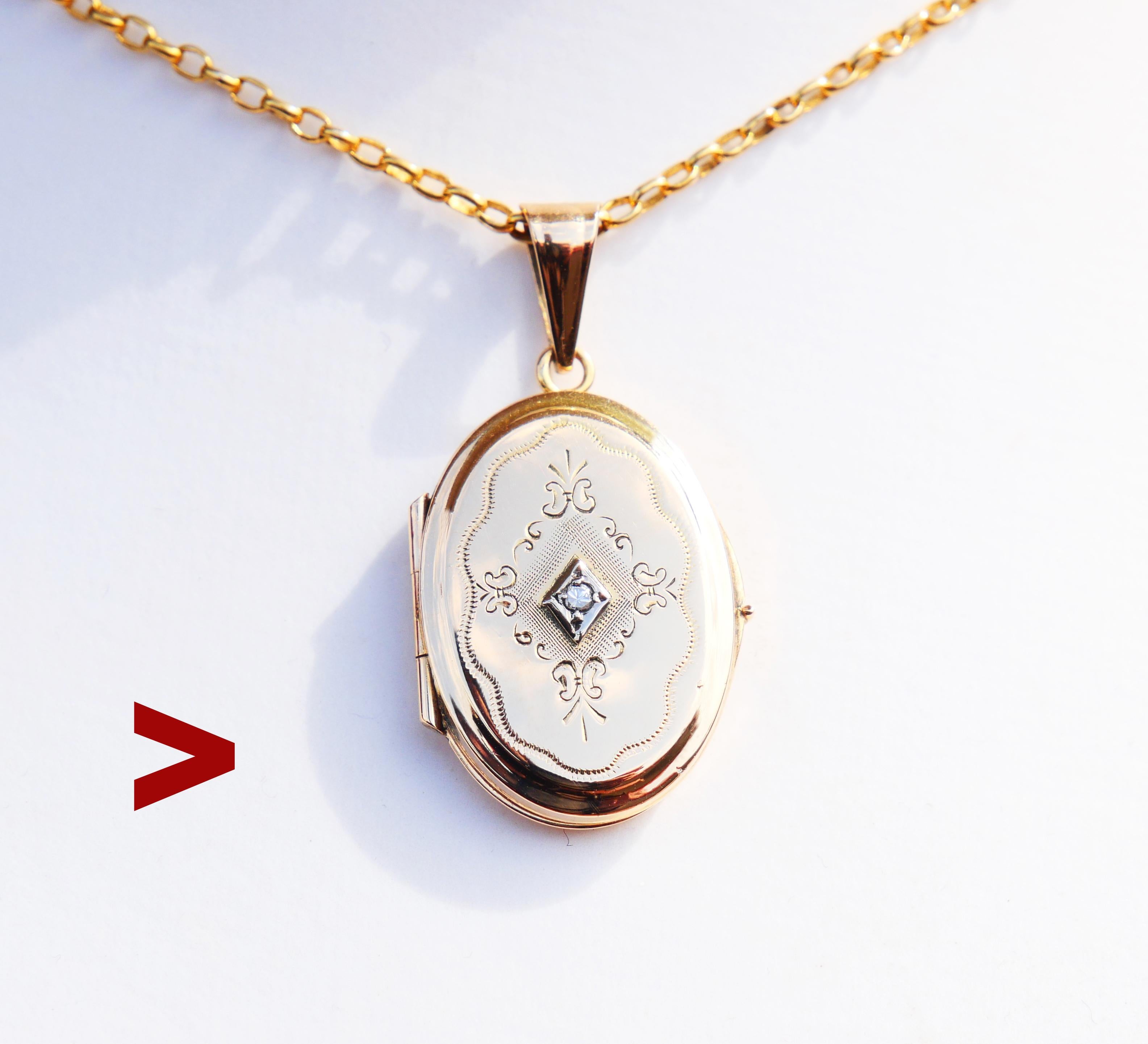 Antique 18K Yellow Gold Pendant Locket with a diamond cut Diamond in white Gold rhombus shaped bezel. Hand-engraved ornament on the front side.

Swedish pendant. Marked 18K. No hallmarks of the year.

Length is 33 mm including hanger x 17 mm x 4.5