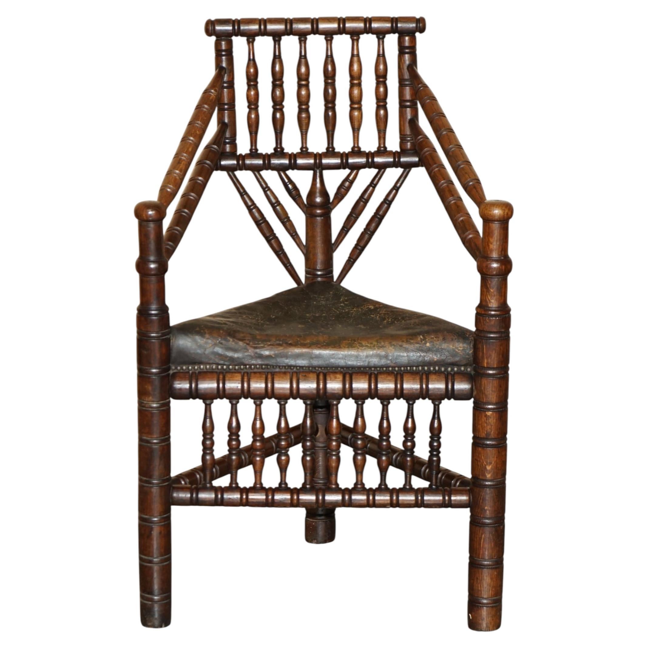 ANTiQUE NORMAN VIKING OR SCANDINAVIAN OAK & AGED BROWN LEATHER TURNERS CHAIR
