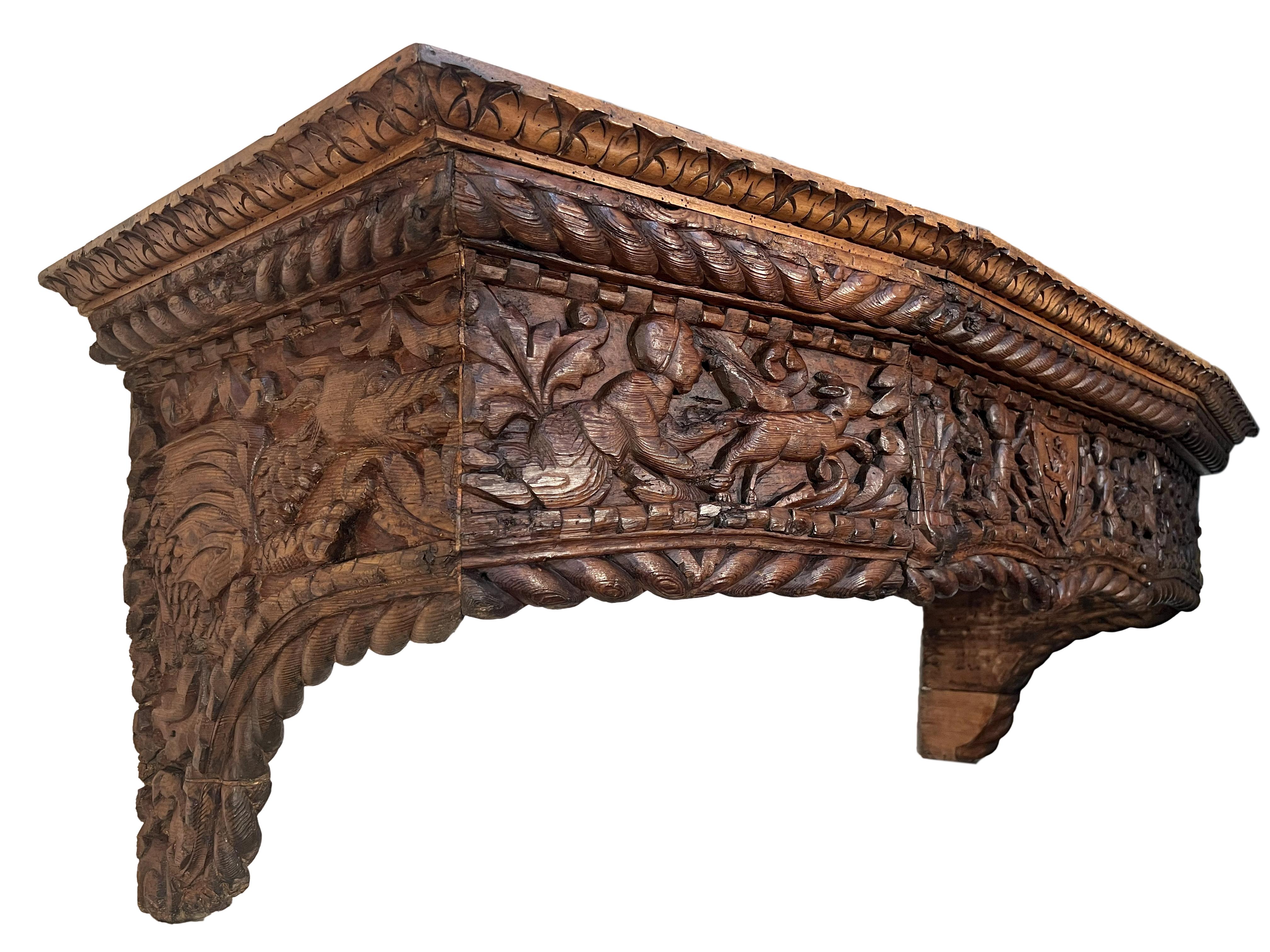 Carved Antique North Italian Chestnut Renaissance style Fire place Mantel. For Sale