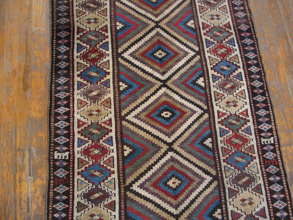 Handmade antique NW Persian carpet. Woven, circa 1900 (early 20th century). Persian informal rug, runner size: 3'2