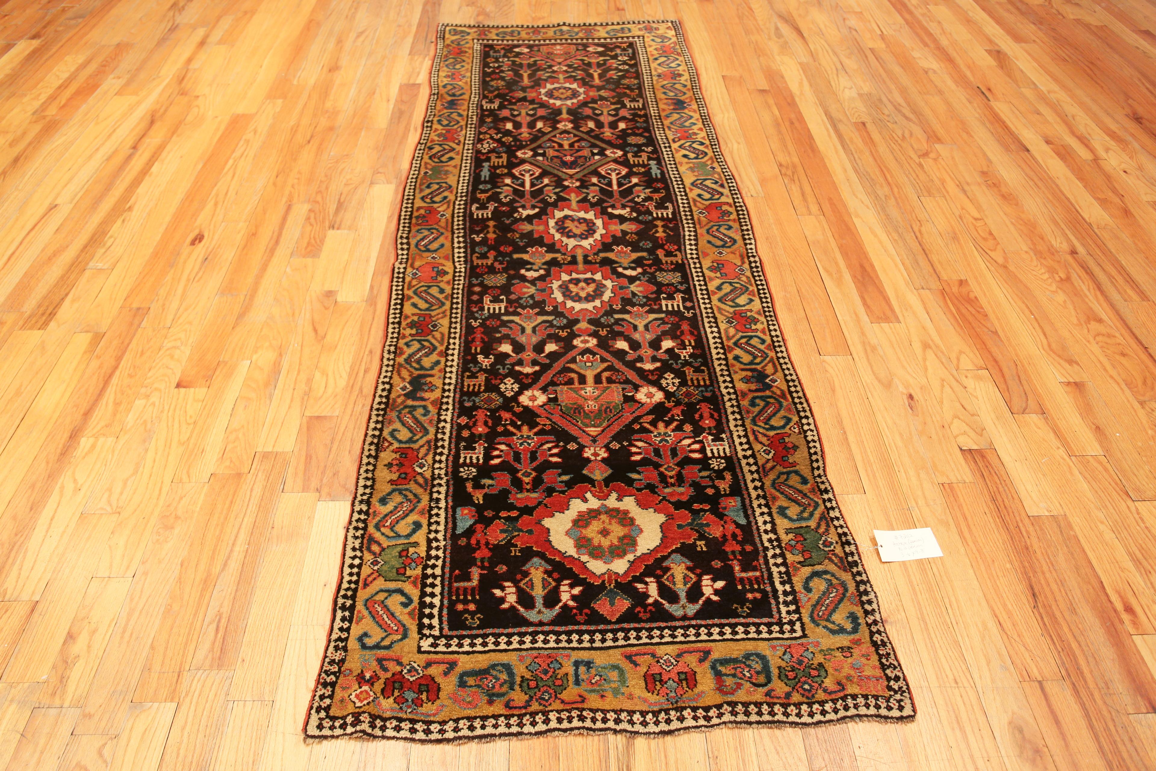 Tribal Antique North West Persian Jewel Tone Hallway Runner Allover Rug, Country of Origin: Persia, Circa date: 1900. Size: 3 ft 6 in x 9 ft 8 in (1.07 m x 2.95 m)