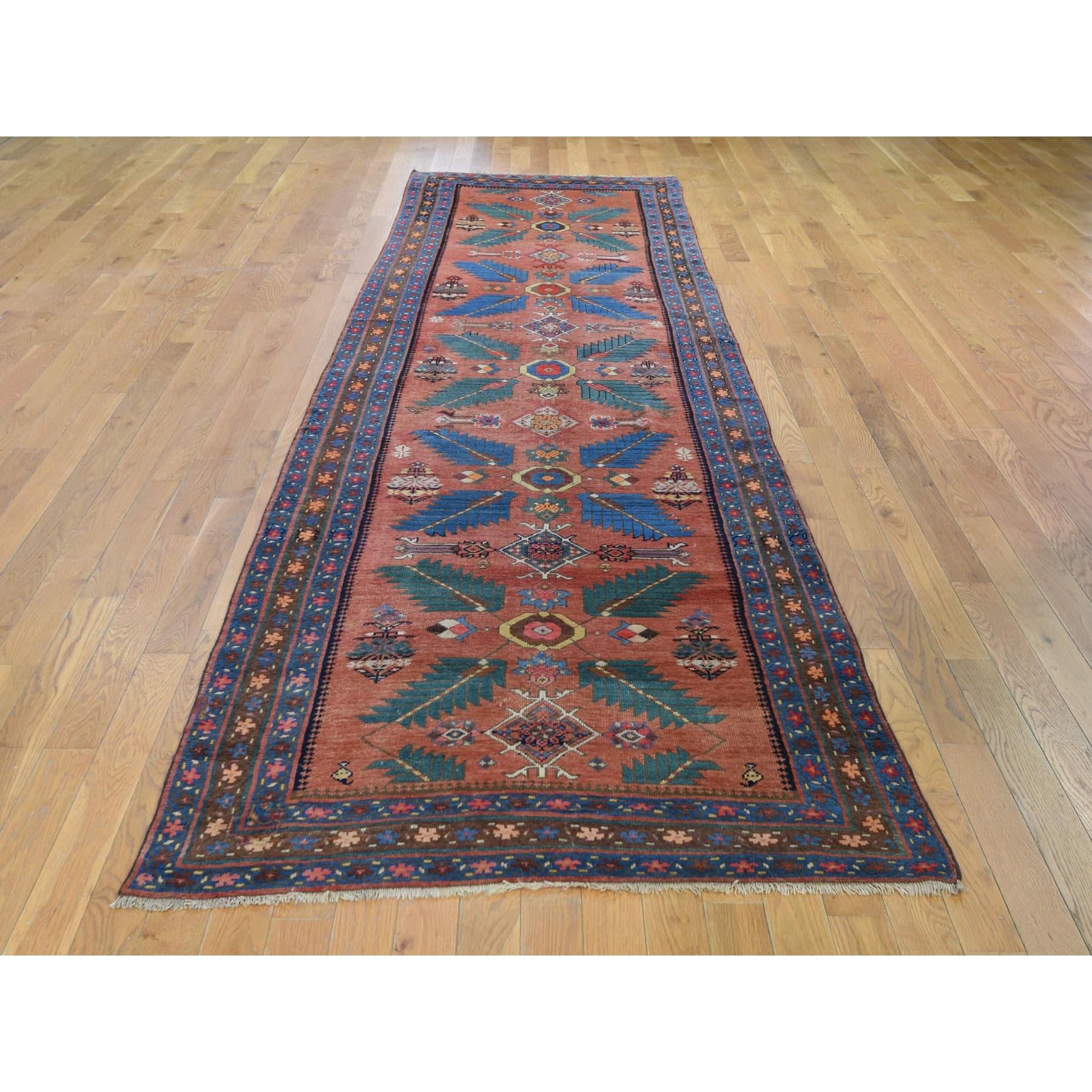 This is a truly genuine one-of-a-kind antique North west Persian wide runner very good condition rug. It has been knotted for months and months in the centuries-old Persian weaving craftsmanship techniques by expert artisans. 

Primary materials: