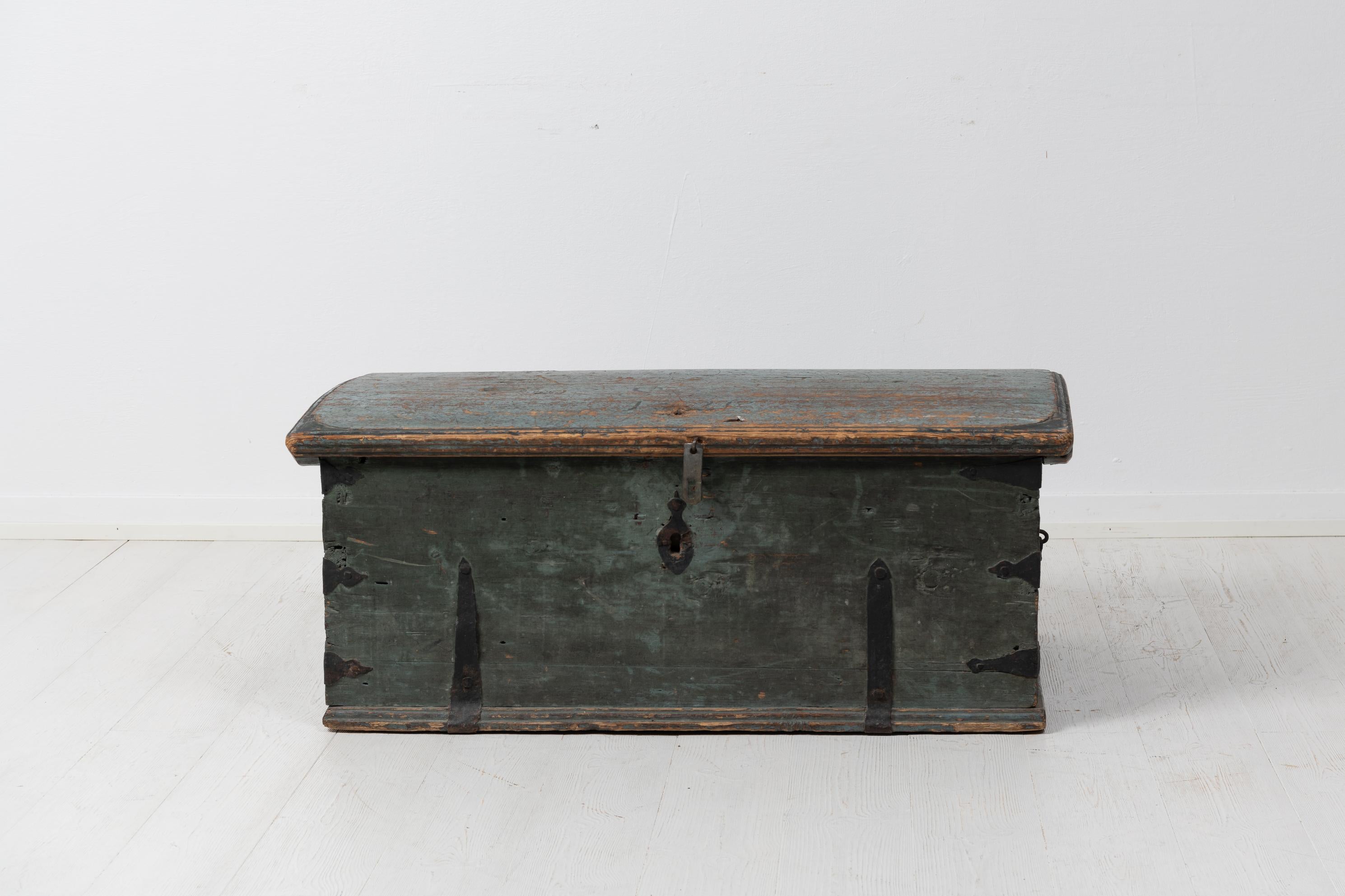 Antique northern Swedish chest in original condition. The chest is an attractive mid size where it’s large enough to be practical as well as stylish while not being too overwhelming. Made in solid pine with the first layer of original paint. The