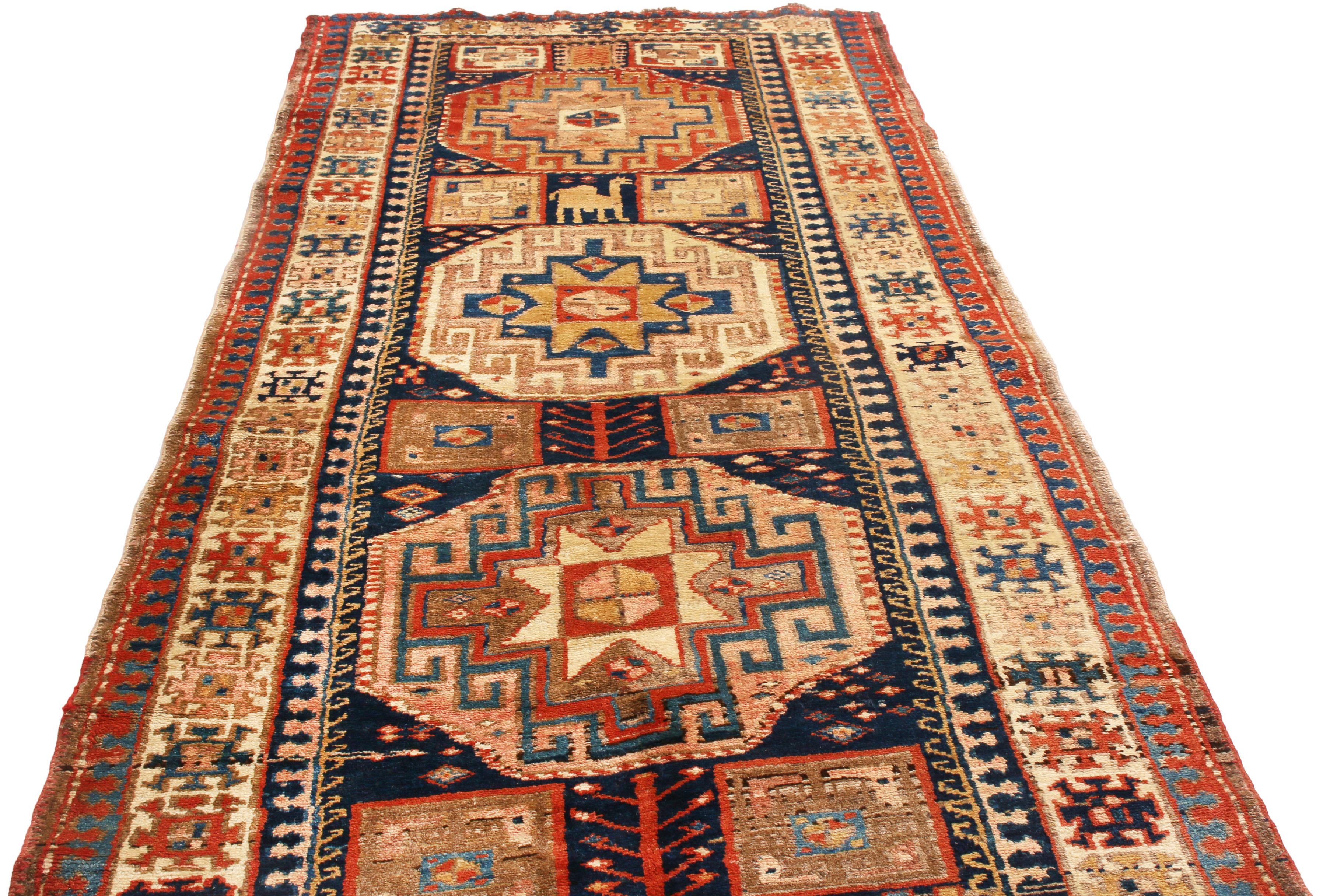 Originating from Persia in 1880, this hand knotted antique Persian wool runner features a distinct Northwest design, denoting a varied, traveled array of influences from Tehran, Tabriz, and other tribal regions of the 19th century. Complemented by