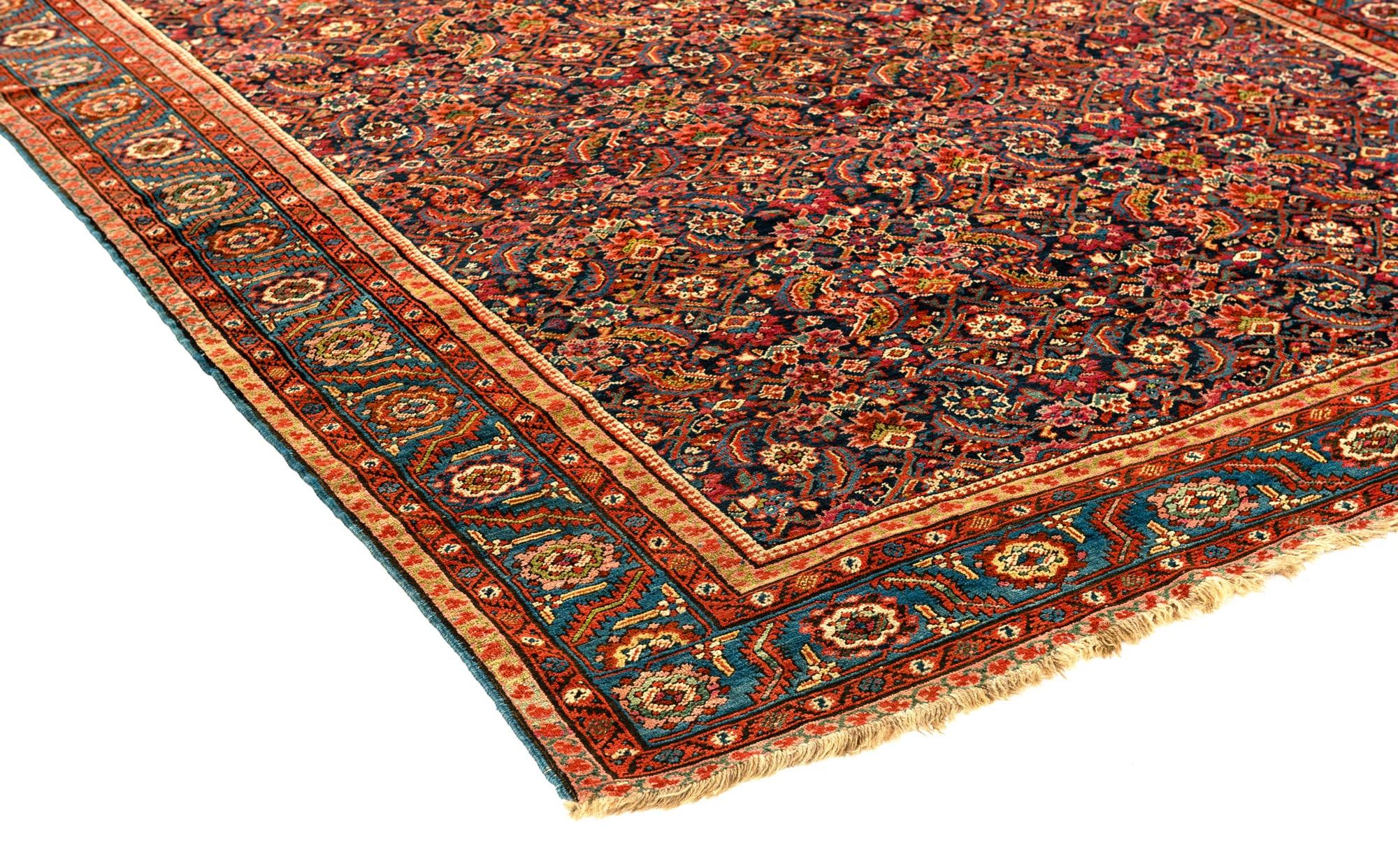 A beautifully executed mid-late 19th century gallery-sized carpet from the region of Heriz in Northwest Persia. The rugs woven in the village of Bakshaish were influenced by traditional motifs. The execution is outstanding considering the piece is