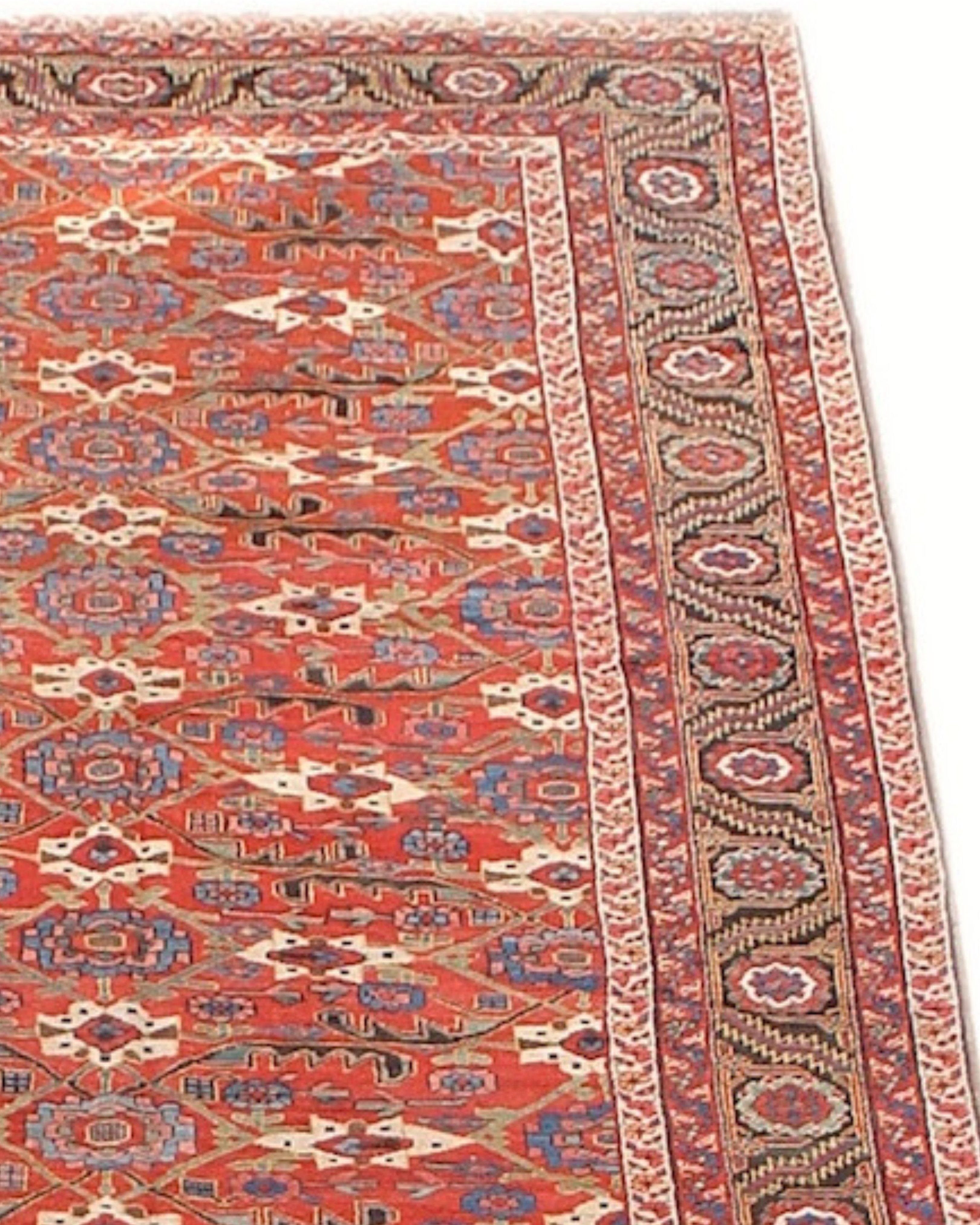 Antique Northwest Persian Rug, 19th Century

This elegant Northwest Persian corridor carpet draws an all over design of rotating blossoms and foliage against a madder red ground. Centered around sky blue rosettes drawn within diamonds, a network of