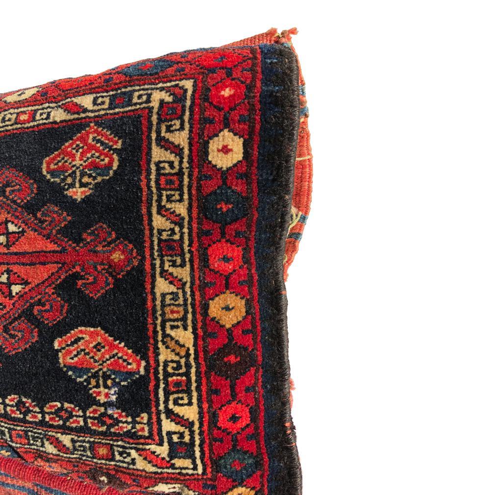 Islamic Antique Northwest Persian Saddle Bag Pair as a Pillow For Sale