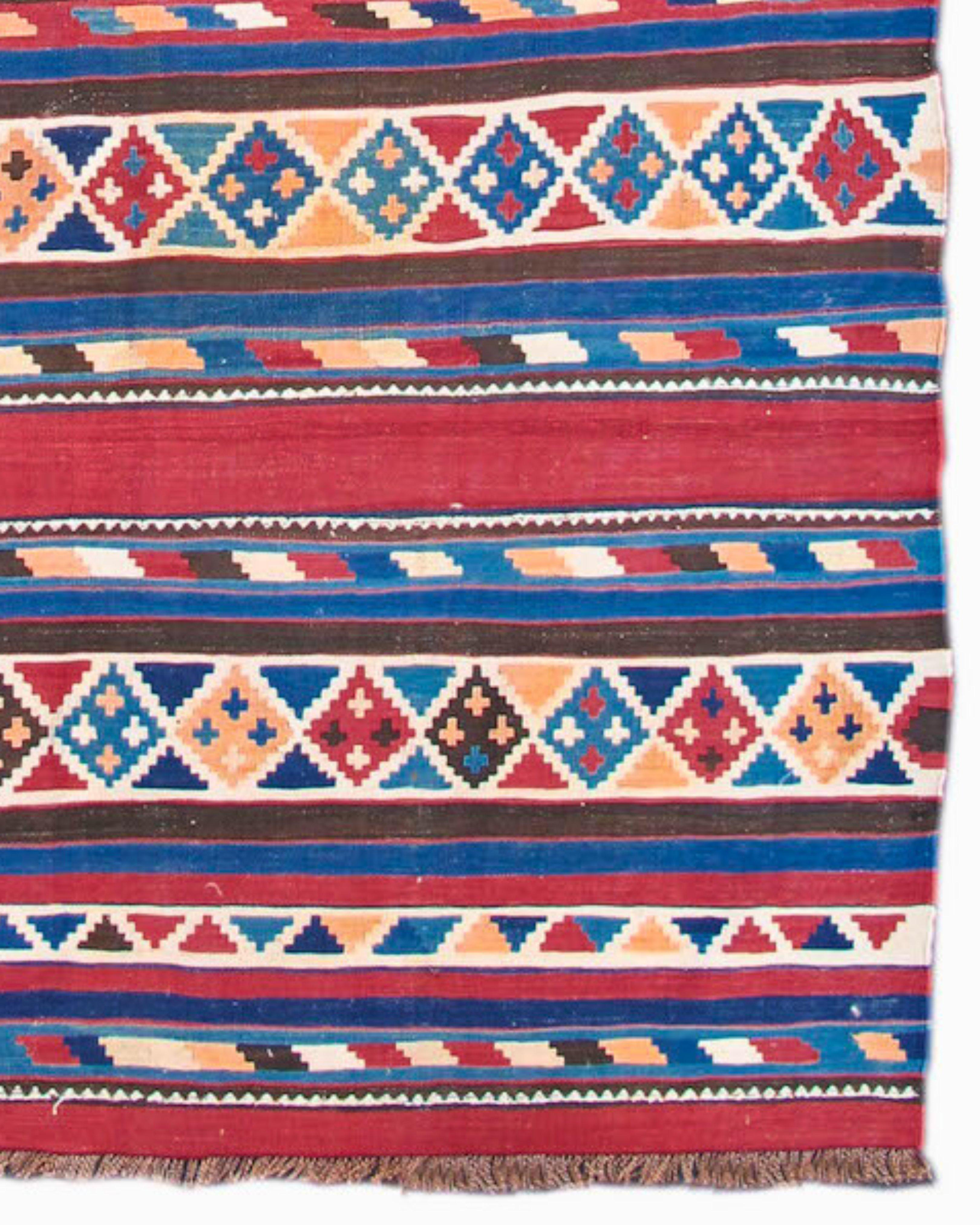 Antique Shahsevan Kilim Rug, c. 1900

This kilim, woven by Shahsevan tribal weavers, was produced in the border area between Persia and the Caucasus. The Shahsevan were comprised of several tribal and ethnic groups brought together by the Imperial
