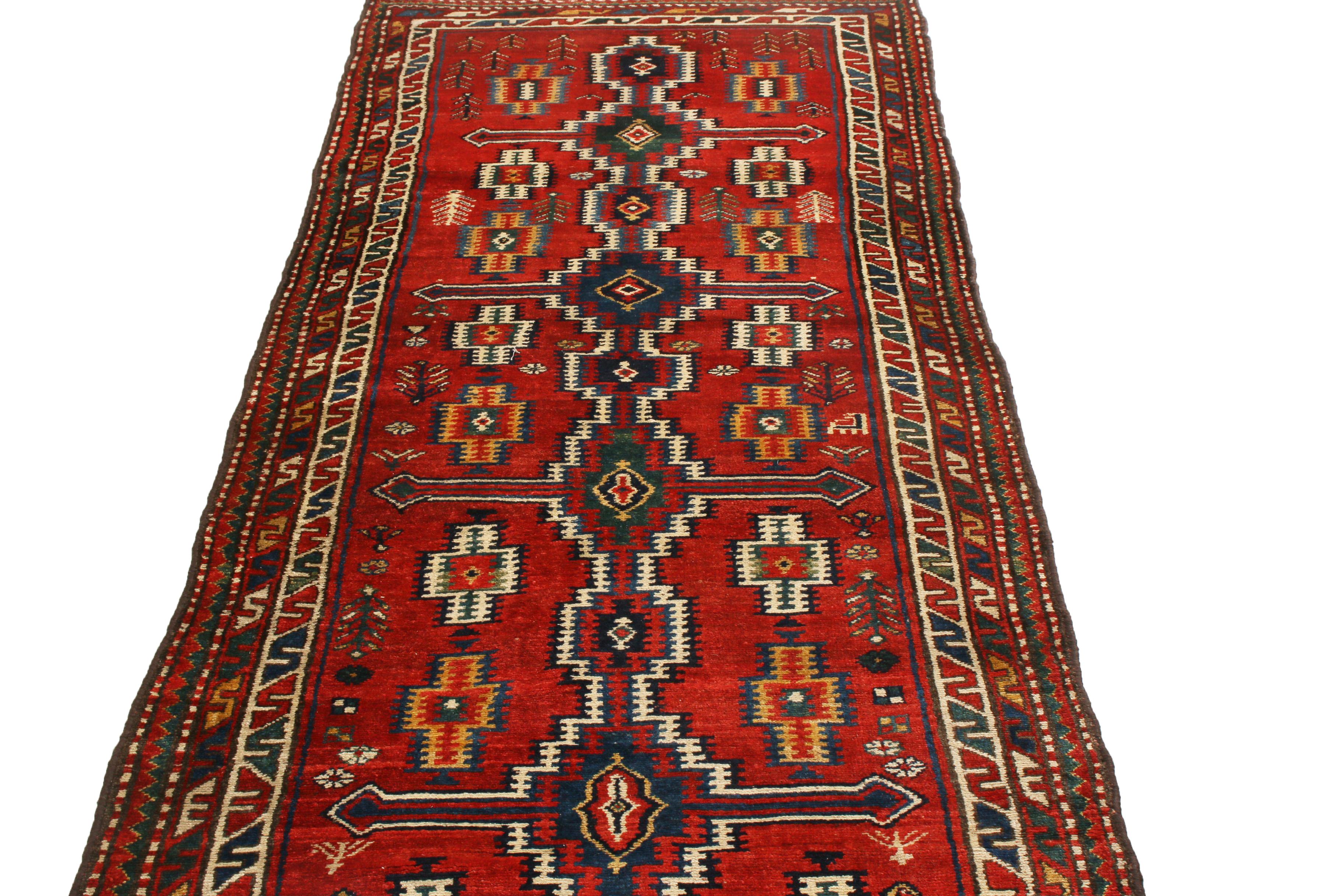 Originating from Persia in 1880, this antique Persian runner features a Northwest design, denoting a varied, traveled array of influences from Tehran, Tabriz, and other tribal regions of the 19th century. Hand-knotted in high-quality wool, the