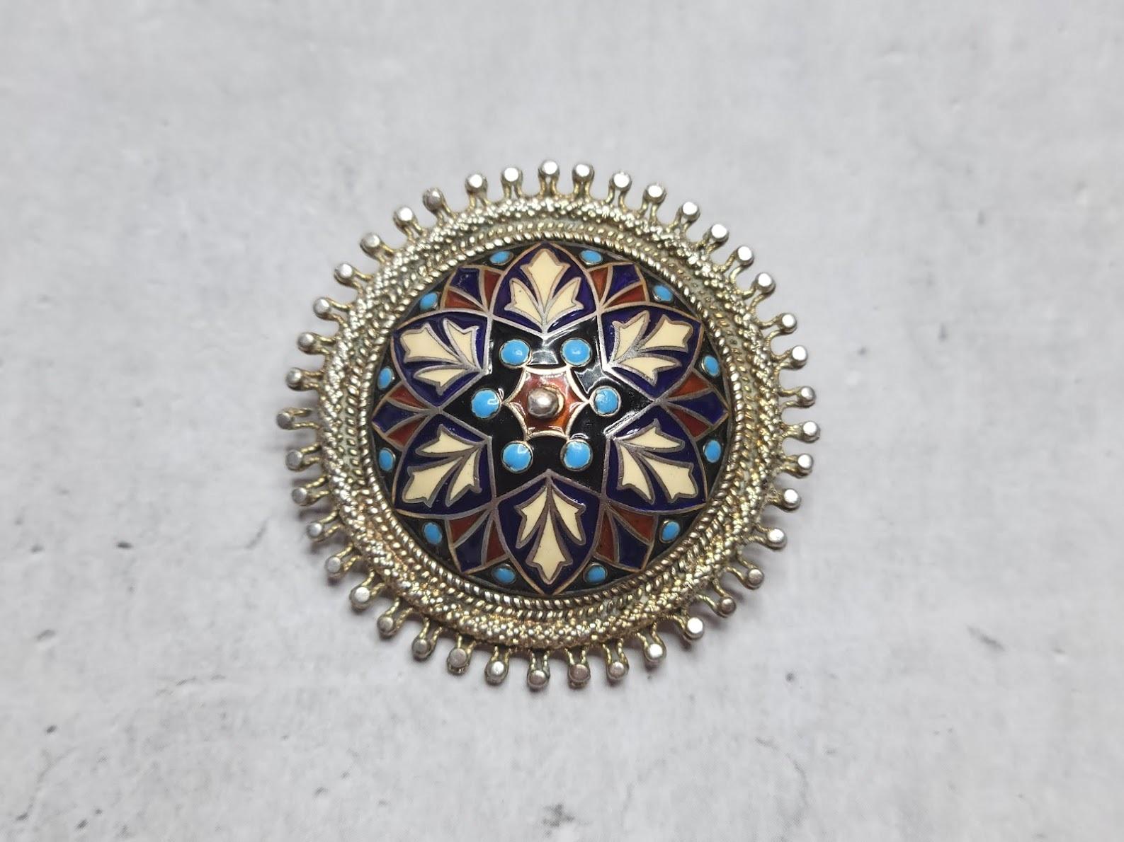 Rare antique 830 sterling silver filigree brooch with colorful enamel by the famous Norwegian craftsman Marius Hammer. Marius Hammer was born in 1847 and worked in his studio in his hometown of Bergen from 1871 to 1927. Hammer was a contemporary of