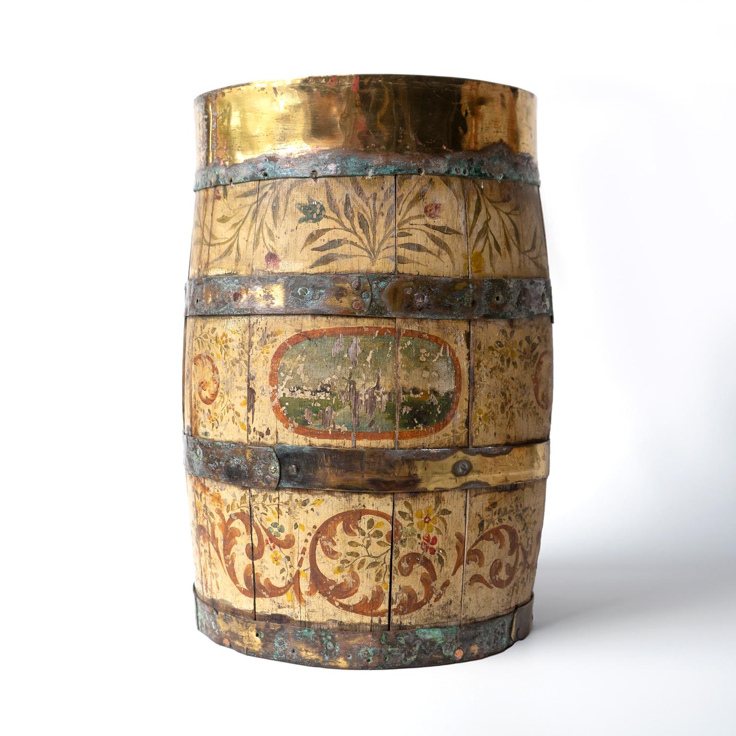 ANTIQUE SCANDINAVIAN HAND PAINTED CONTAINER 
An oak coopered barrel stick stand with brass banding which has been lovingly painted with stylised floral and foliate decoration throughout, each side there is a landscape depicted, one side with a young