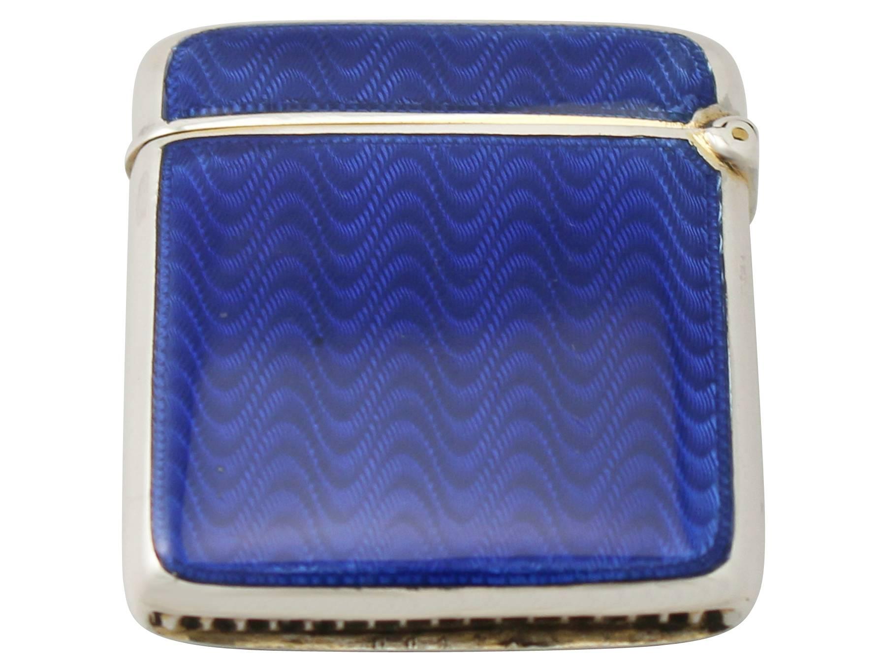 A fine antique sterling silver and guilloche enamel vesta case: part of our enameled silver collection

This fine antique sterling silver and guilloche enamel vesta case has a plain square shaped form with rounded corners.

The front and reverse
