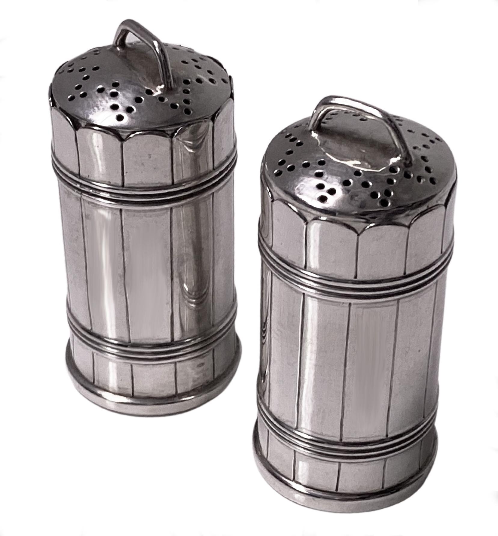 Pair Antique novelty Silver Casters in the form of Barrels Birmingham 1908 Levi and Salaman. Realistically styled with panel and ribbed bodies and handles to the barrels and pierced covers. Pull off covers to allow access. Fully hallmarked and