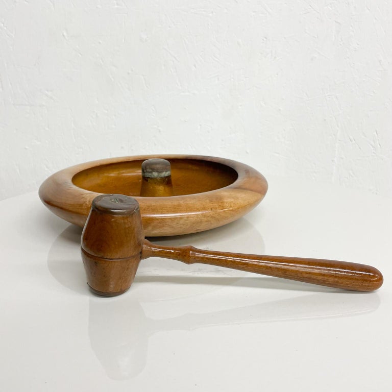 Vintage solid maple & bronze nutcracker dish set including Hammer Mallet Nutcracker tool
Bowl 10.5 in diameter x 2 tall, Hammer 9.25 L x 3 D x 1.5 W
No label visible. Maple and bronze. Patina present.
Exterior wood refinished. Interior retains