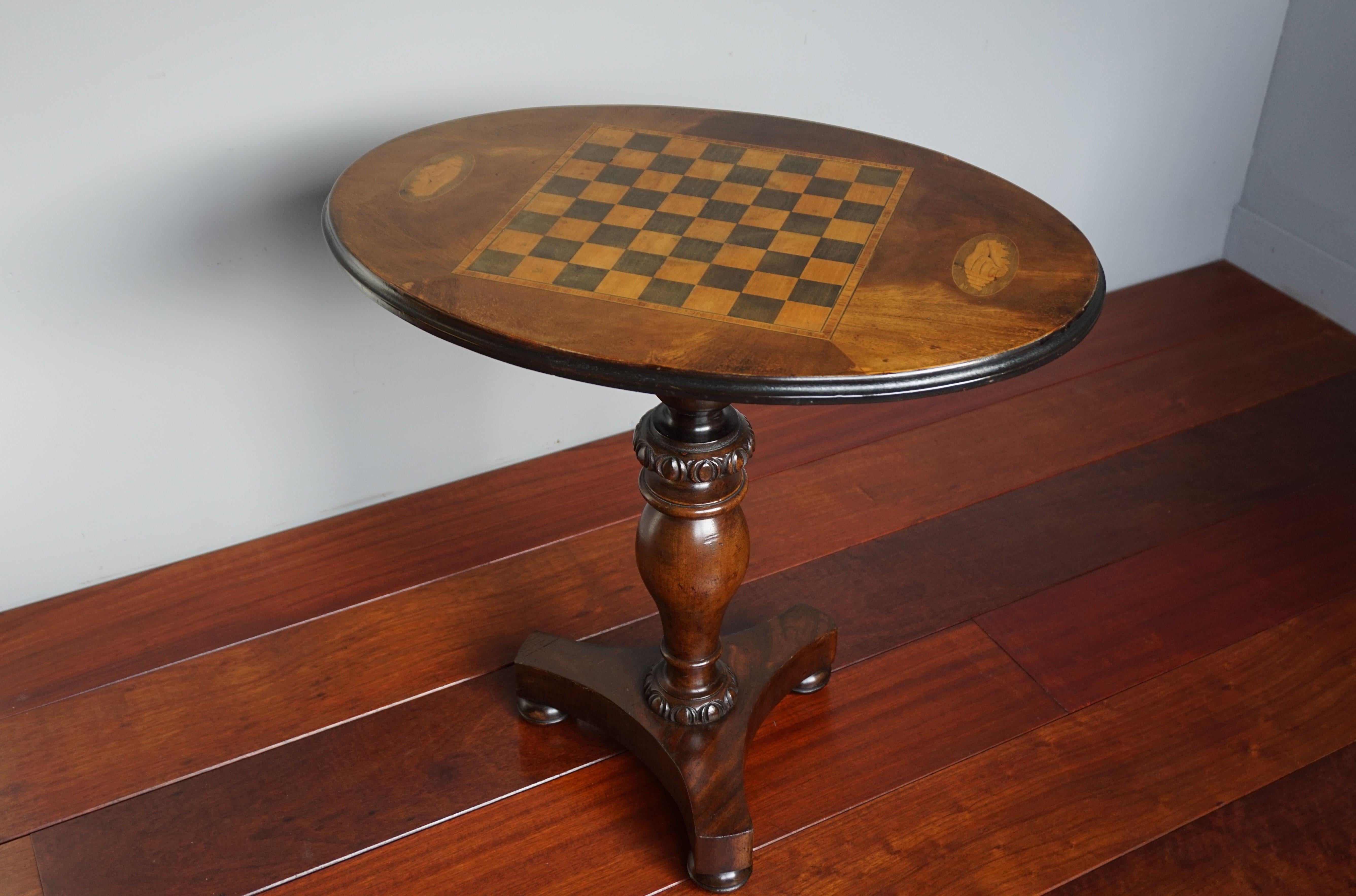 Stunning and practical size, oval chess table inlaid with satinwood.

If you are chess playing enthousiast and you like to play the game of chess with family or friends then this table could be perfect for you. Even if you hardly play at all, it is