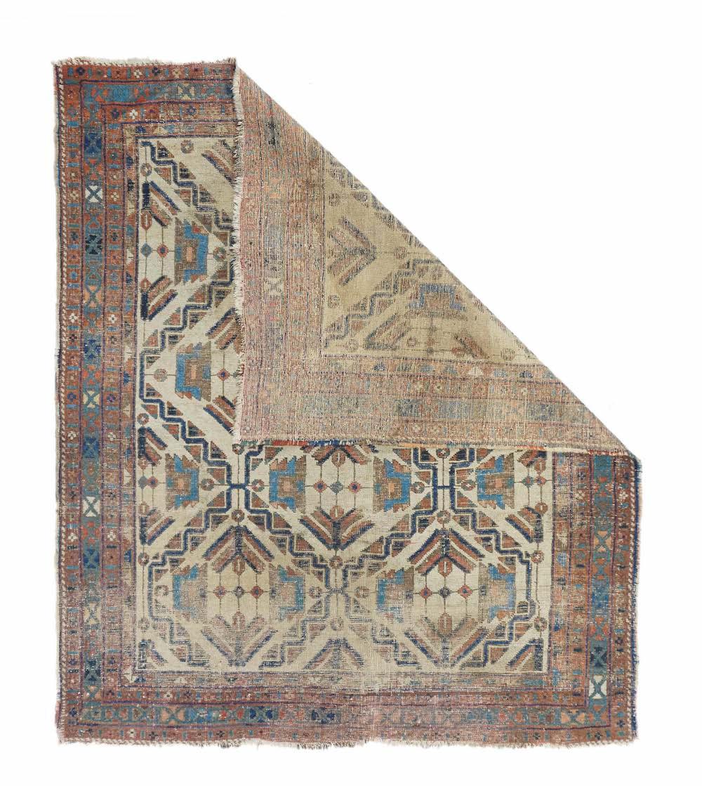 Antique NW Bakhshayesh Rug 5'0'' x 6'0''. Definitely in an Afshar style, this moderately woven rustic scatter shows a natural beige wool field patterned by a giant hexagonal offset lattice, with zig-zags and triangles in the framework. Each reserve