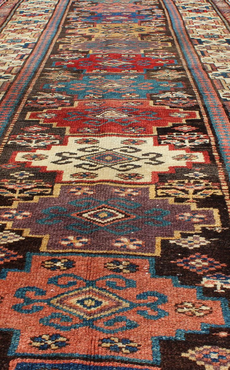 Hand-Knotted Antique N.W. Persian Gallery Rug in Jewel Tones with Diamond Geometric Motifs For Sale