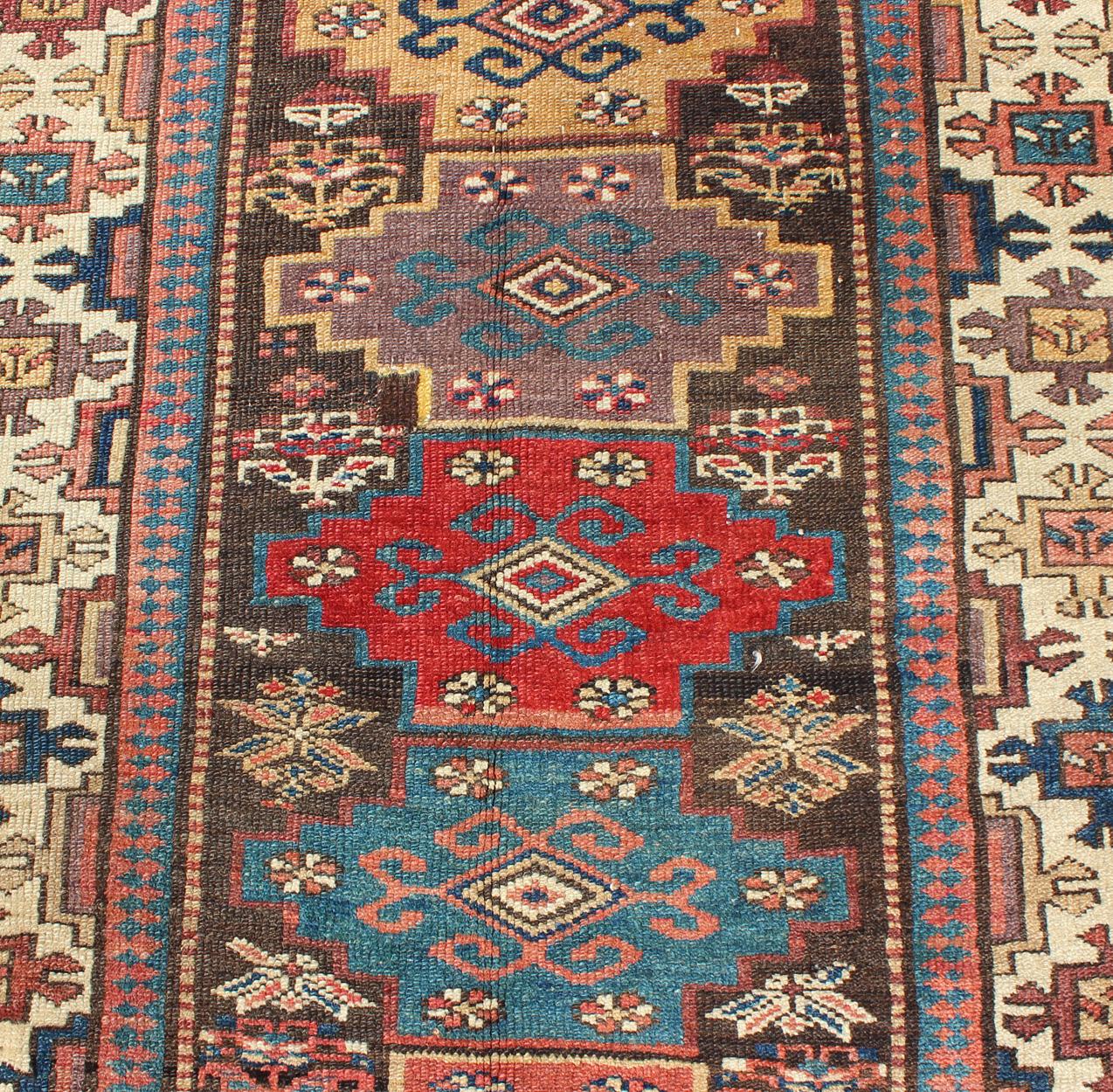 Antique N.W. Persian Gallery Rug in Jewel Tones with Diamond Geometric Motifs In Good Condition For Sale In Atlanta, GA