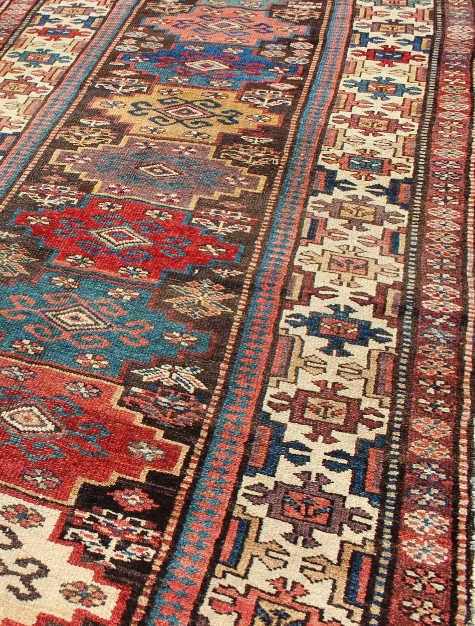 Antique N.W. Persian Gallery Rug in Jewel Tones with Diamond Geometric Motifs For Sale 1