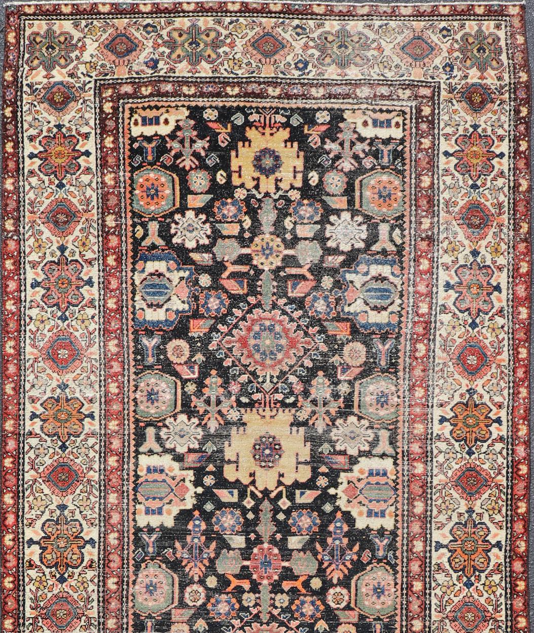 Wool Antique N.W. Persian Large Gallery Rug in Navy Blue Background & All over Design For Sale