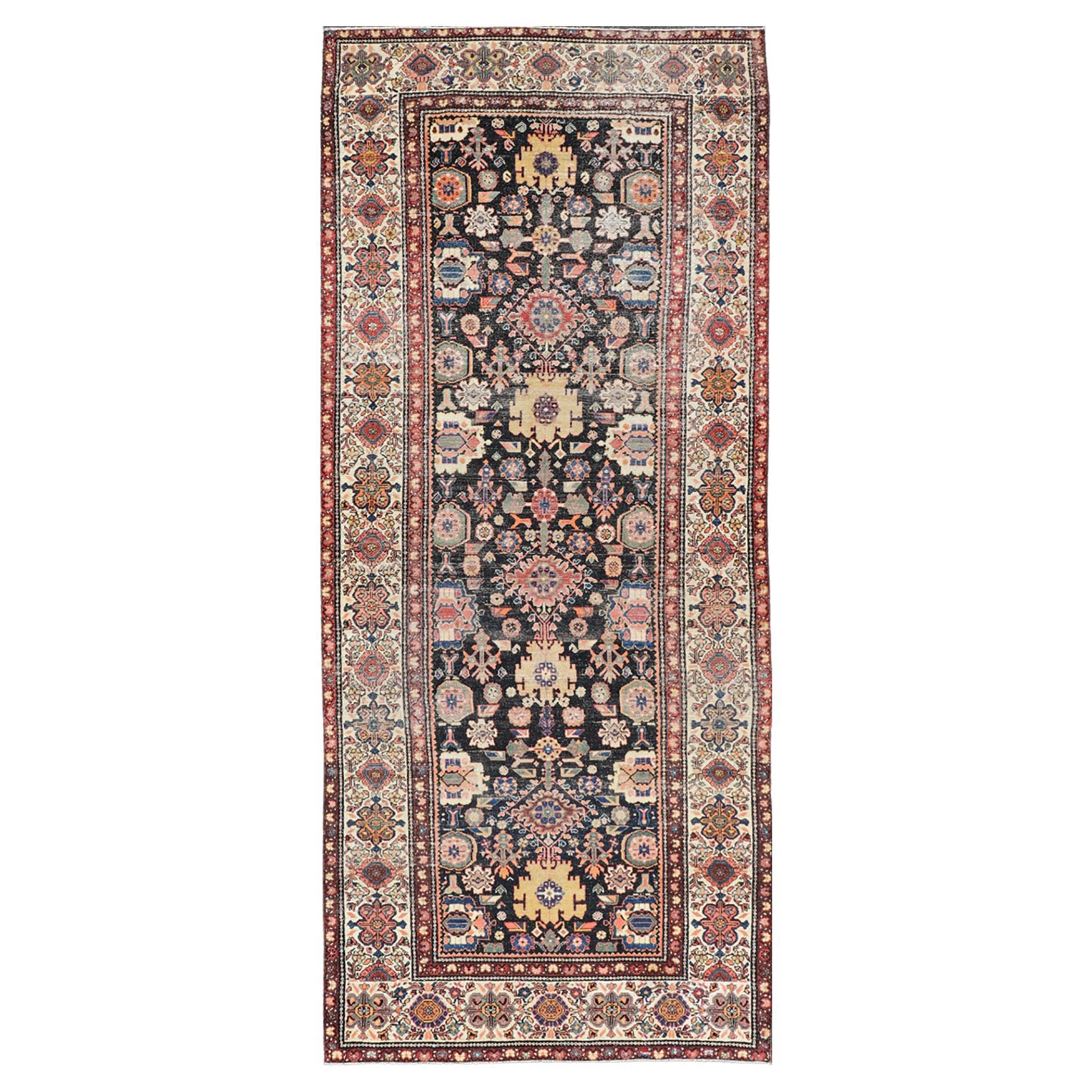 Antique N.W. Persian Large Gallery Rug in Navy Blue Background & All over Design For Sale