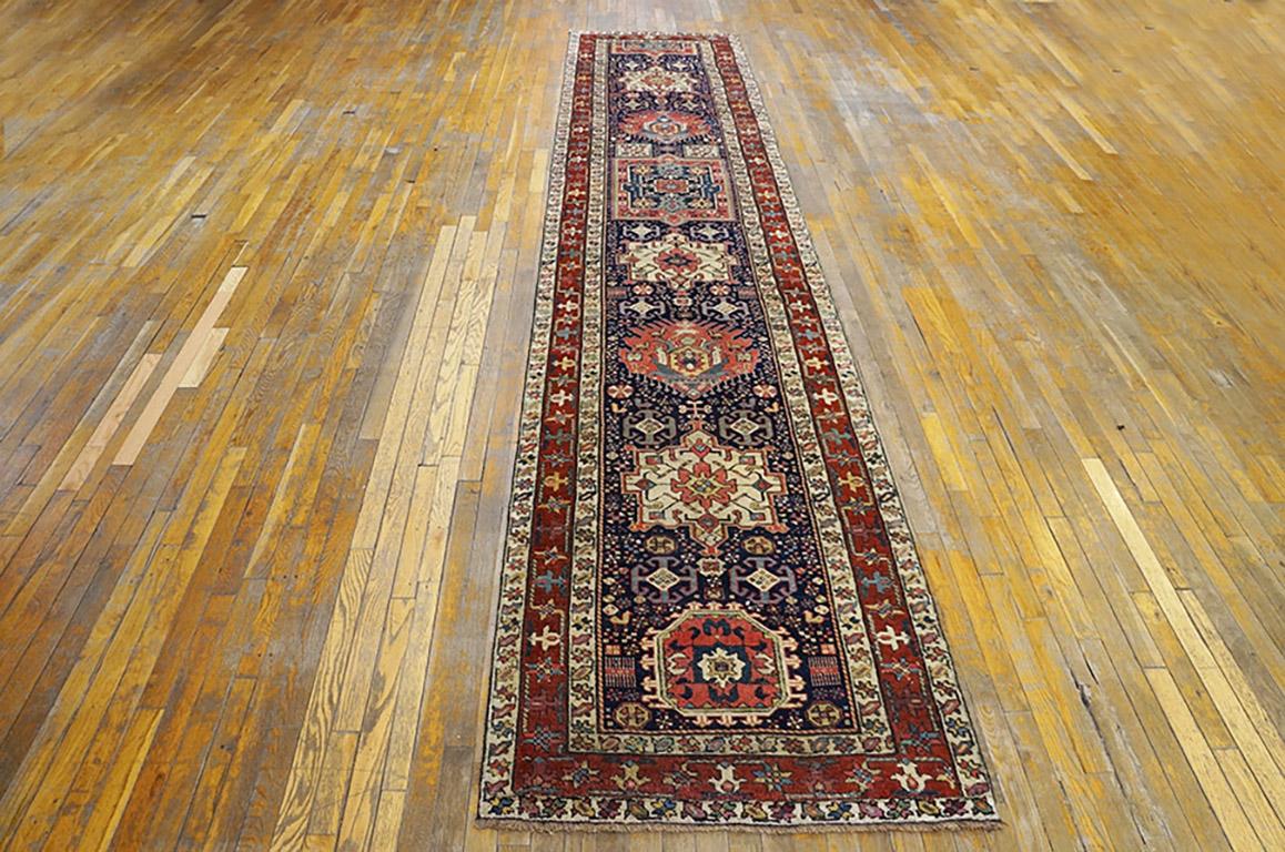 19th Century N.W. Persian Shahsavan Carpet ( 3' x 16' - 90 x 488 )
Blue background with stacked medallion design and red and ivory borders. Hand knotted wool construction.