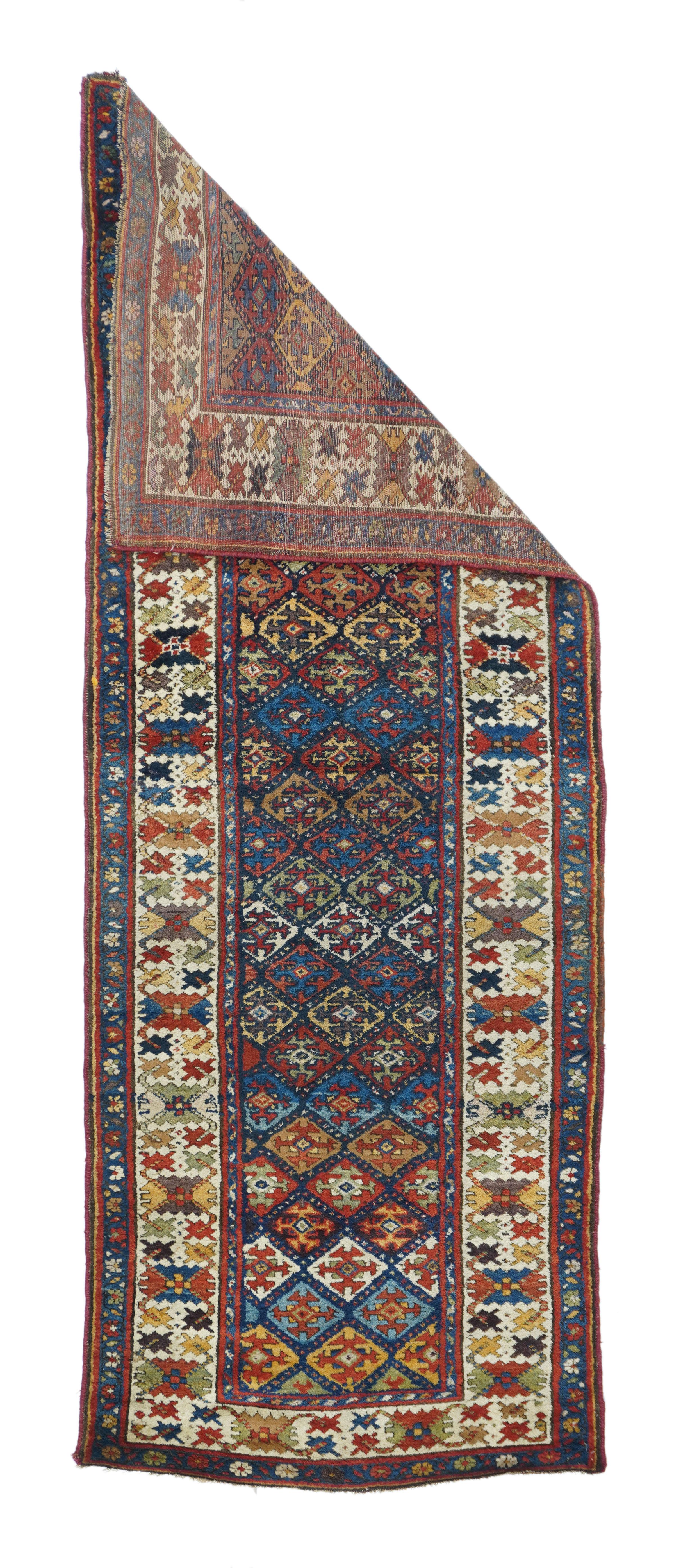 Antique NW Persian rug, measures :  3'5'' x 9'2''. A Neo-Kazak Kurdish runner with a colorful version of the 