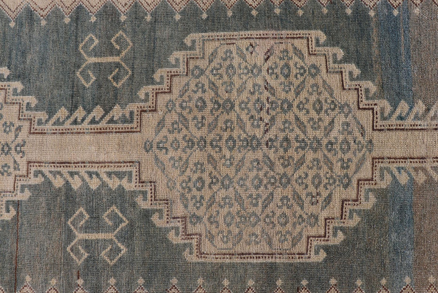 Antique N.W. Persian runner in gray blue & steel blue background & connected Medallions. Keivan Woven Arts / rug VAS-3-13986, country of origin / type: Iran / N.W. Persian, circa 1920.

Measures: 3'6 x 12'5 

This magnificent antique Persian