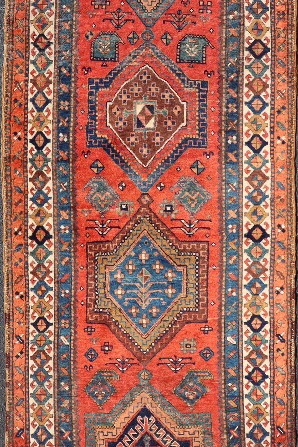 Hand-Knotted Antique NW Persian Runner With Geometric Medallions and Bold Colors 3'4 x 9'9 For Sale