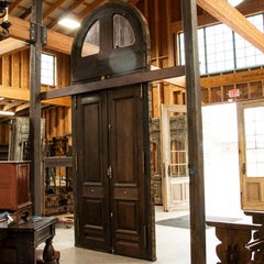 Antique Oak Tall Exterior Carved Doors with Arched Transom and Frame