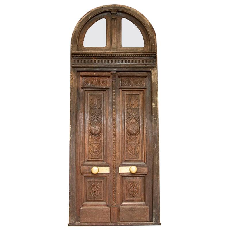 Antique Oak Tall Exterior Carved Doors with Arched Transom and Frame