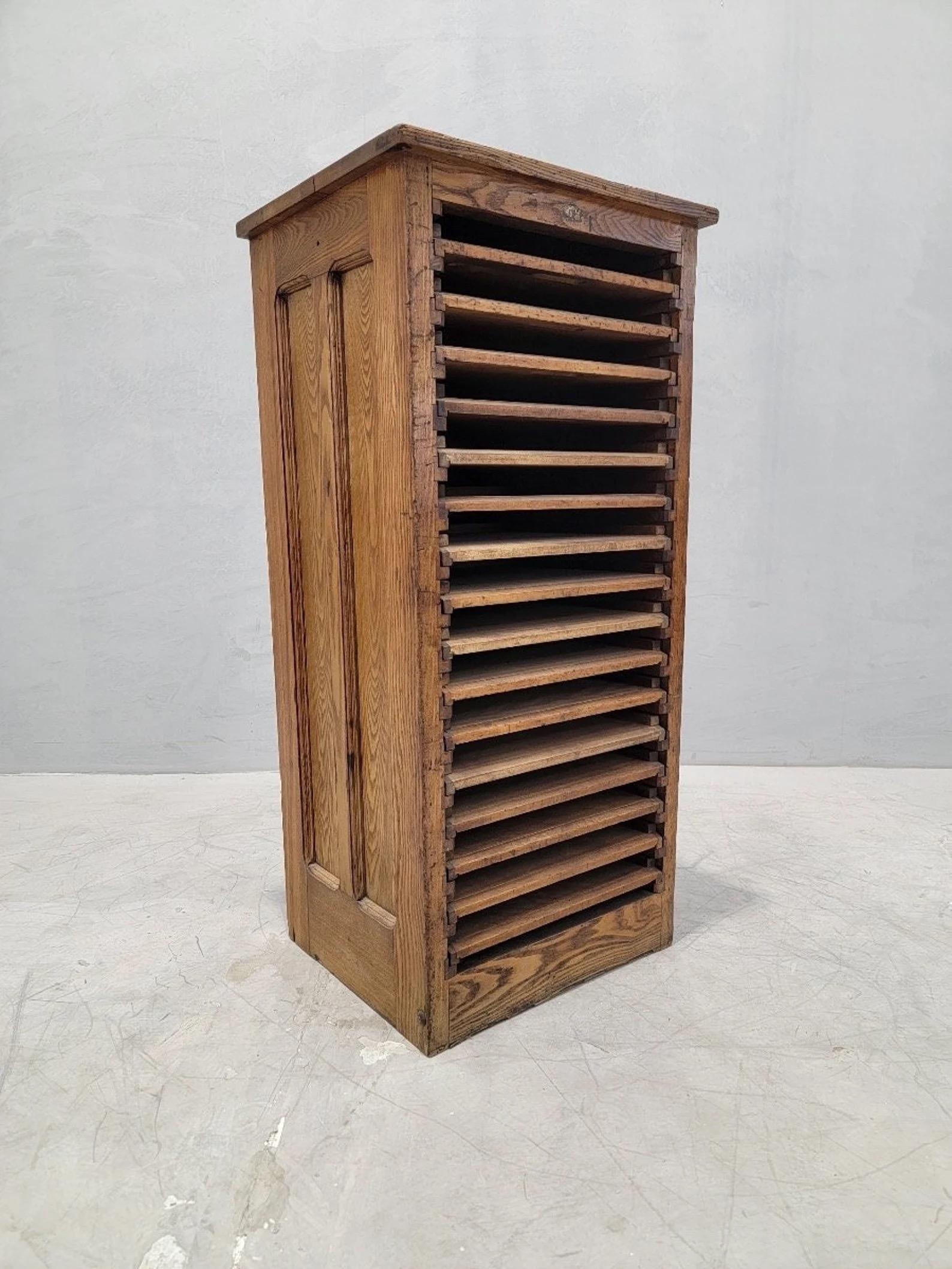 Antique Oak 16 Drawer Typesetter's Letterhead Filer

The Antique Oak 16 Drawer Typesetter's Letterhead Filer is a beautifully crafted filing cabinet, originally utilized in a typesetter's office, now repurposed for versatile storage solutions. Its