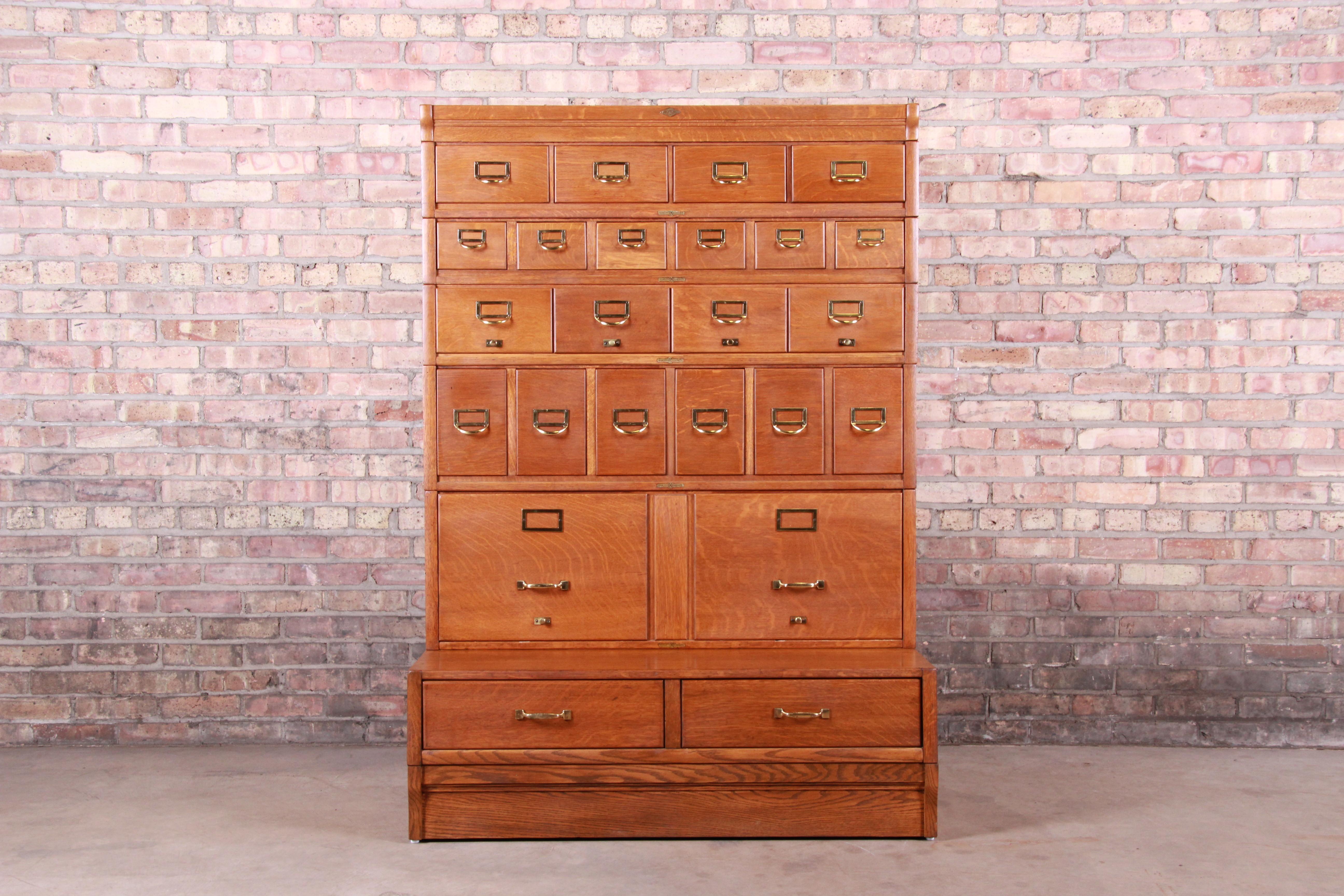 A rare and exceptional antique oak 24-drawer card catalog file cabinet

By Browne Morse

USA, circa 1920s

Quarter sawn oak, with brass hardware.

Measures: 41.88