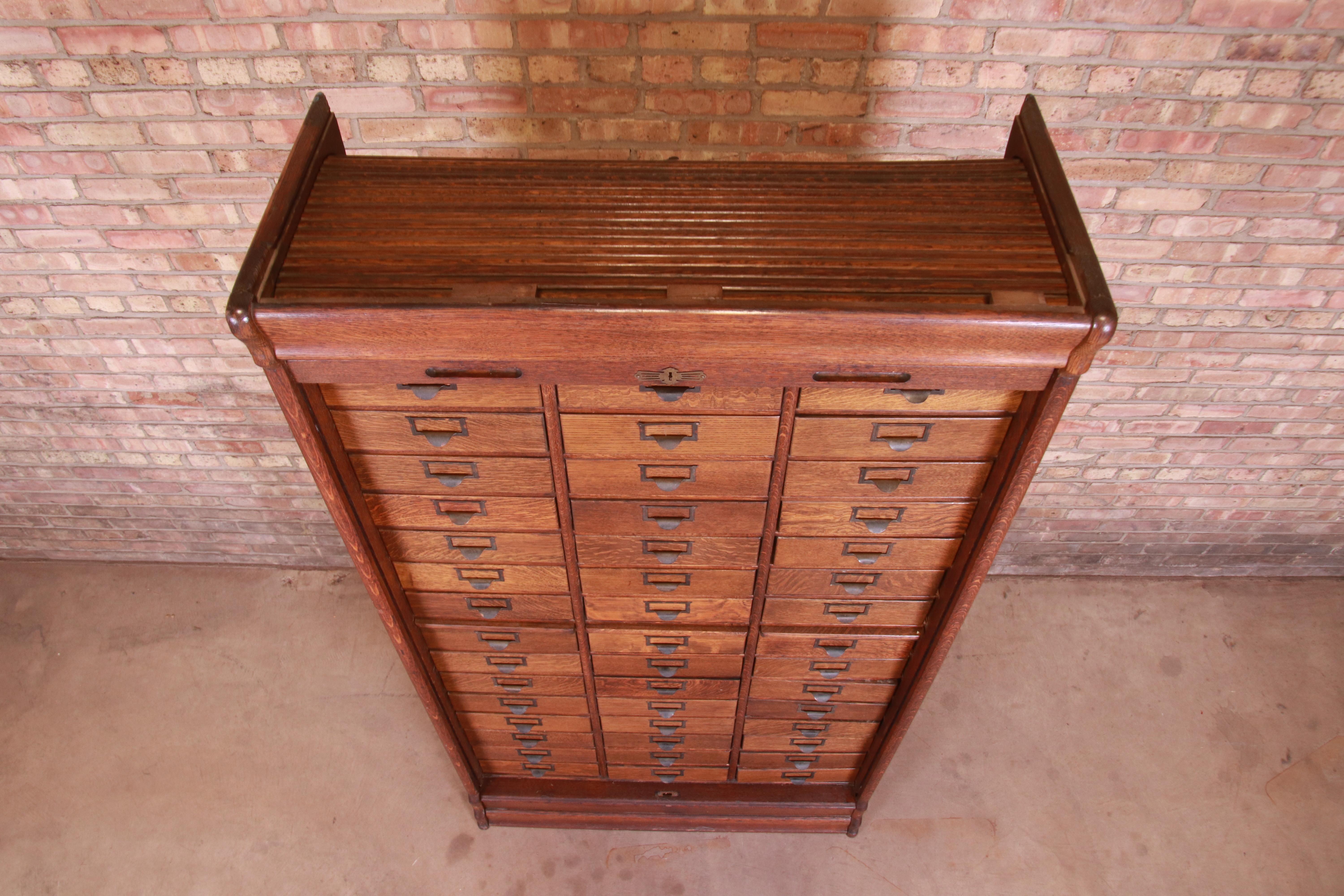 Antique Oak 45-Drawer Cabinet with Roll Down Tambour Door, circa 1900 5