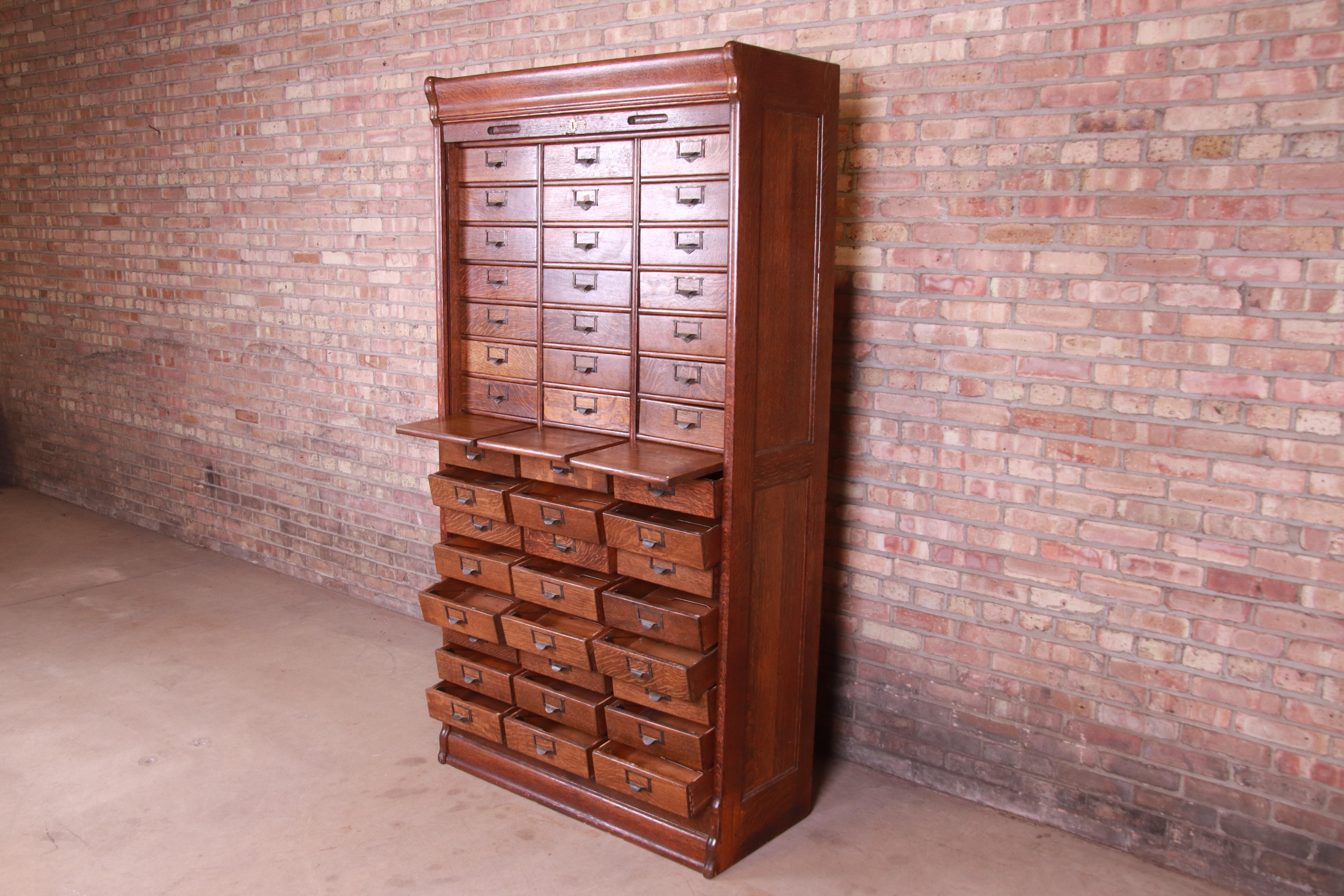 American Antique Oak 45-Drawer Cabinet with Roll Down Tambour Door, circa 1900