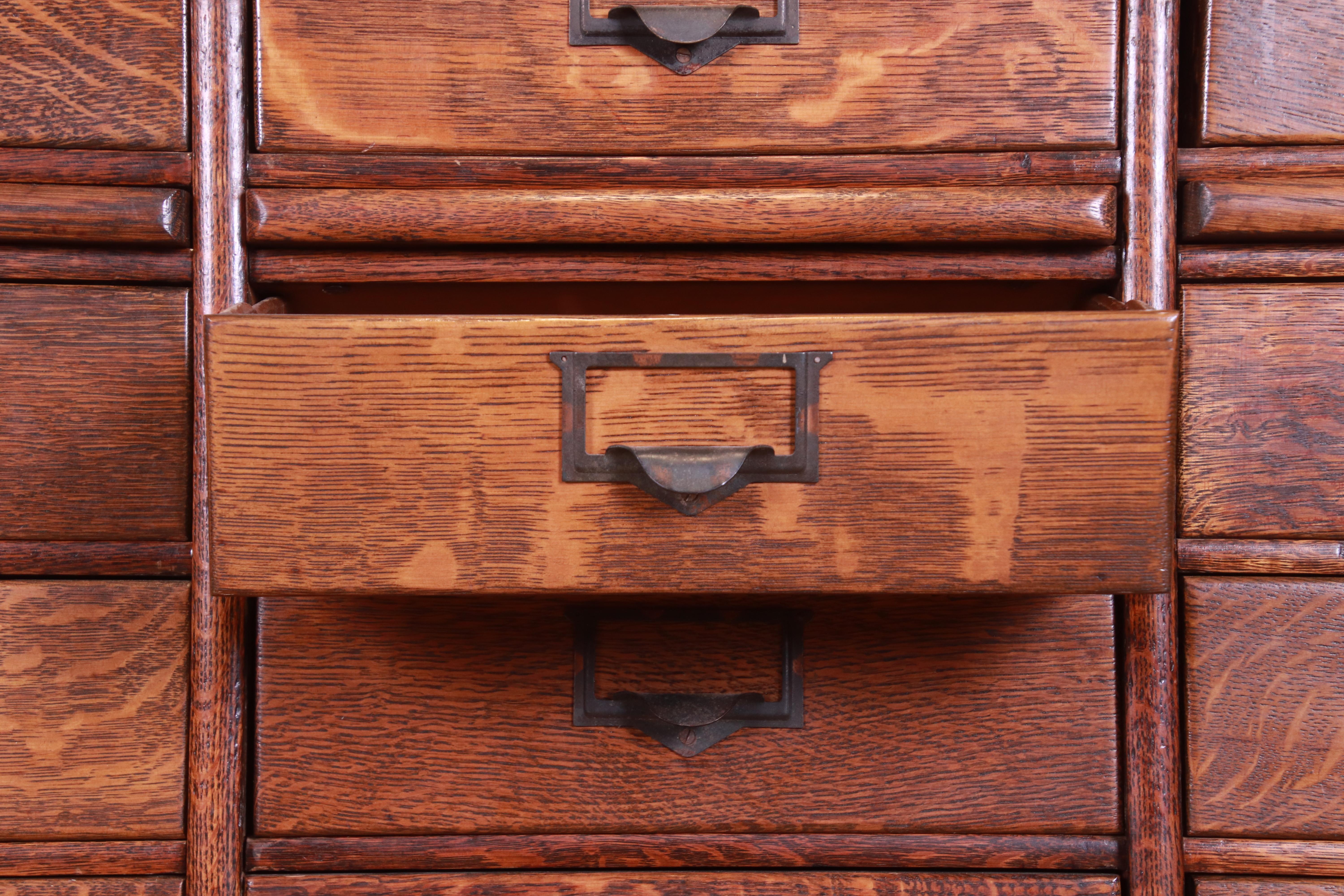20th Century Antique Oak 45-Drawer Cabinet with Roll Down Tambour Door, circa 1900