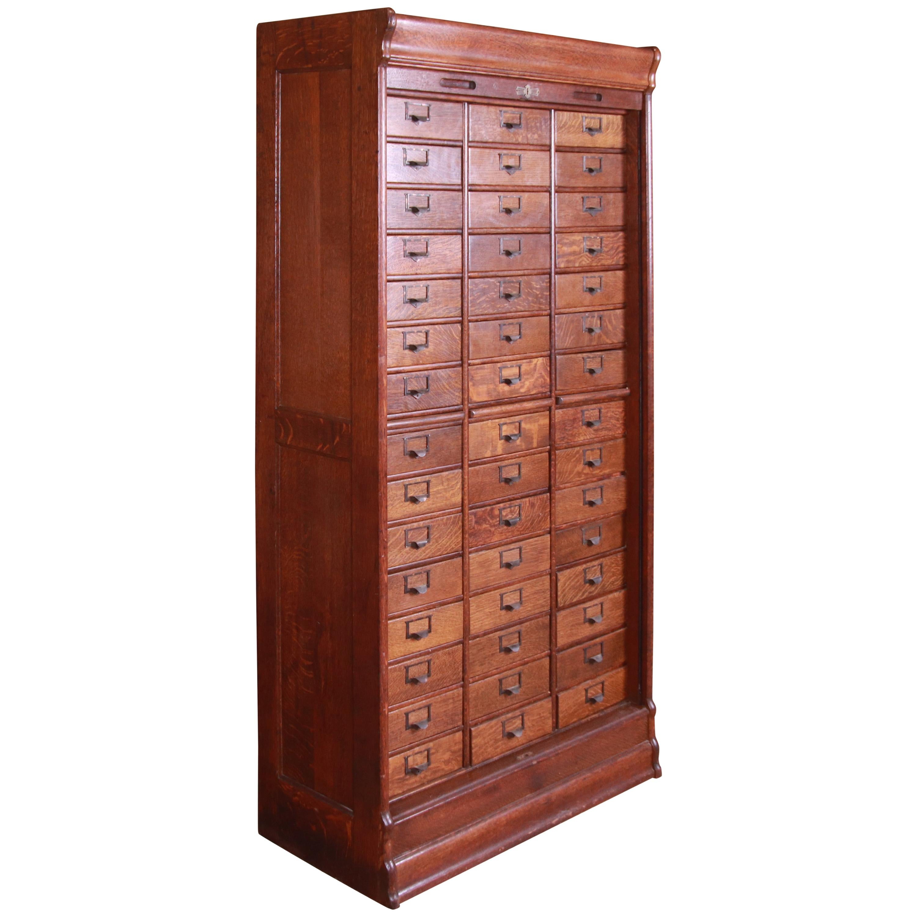 Antique Oak 45-Drawer Cabinet with Roll Down Tambour Door, circa 1900