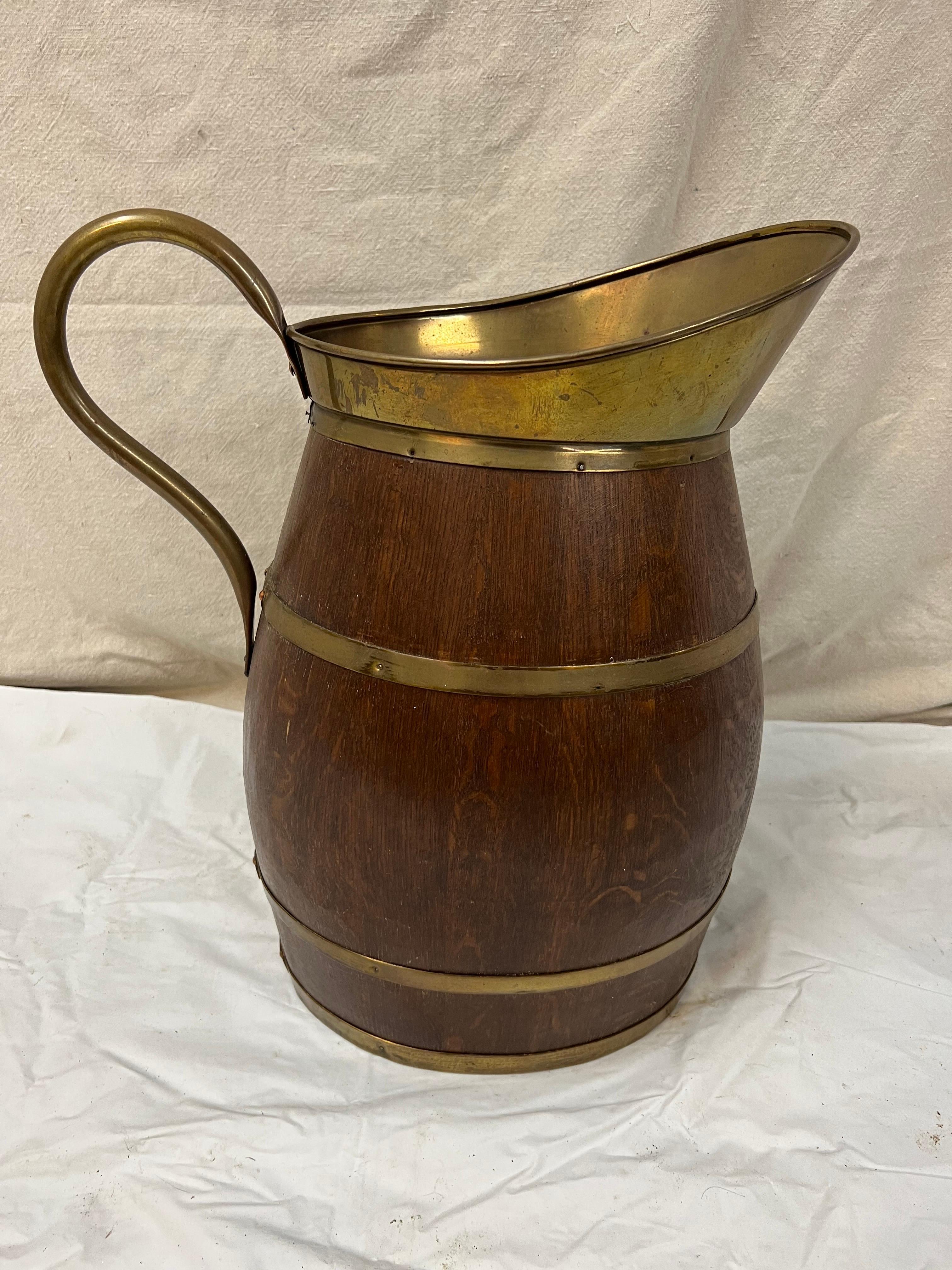 Large antique oak and brass Barrell or umbrella holder. Lovely quarter sawn oak with polished brass trim. Please confirm the dimensions prior to purchase.